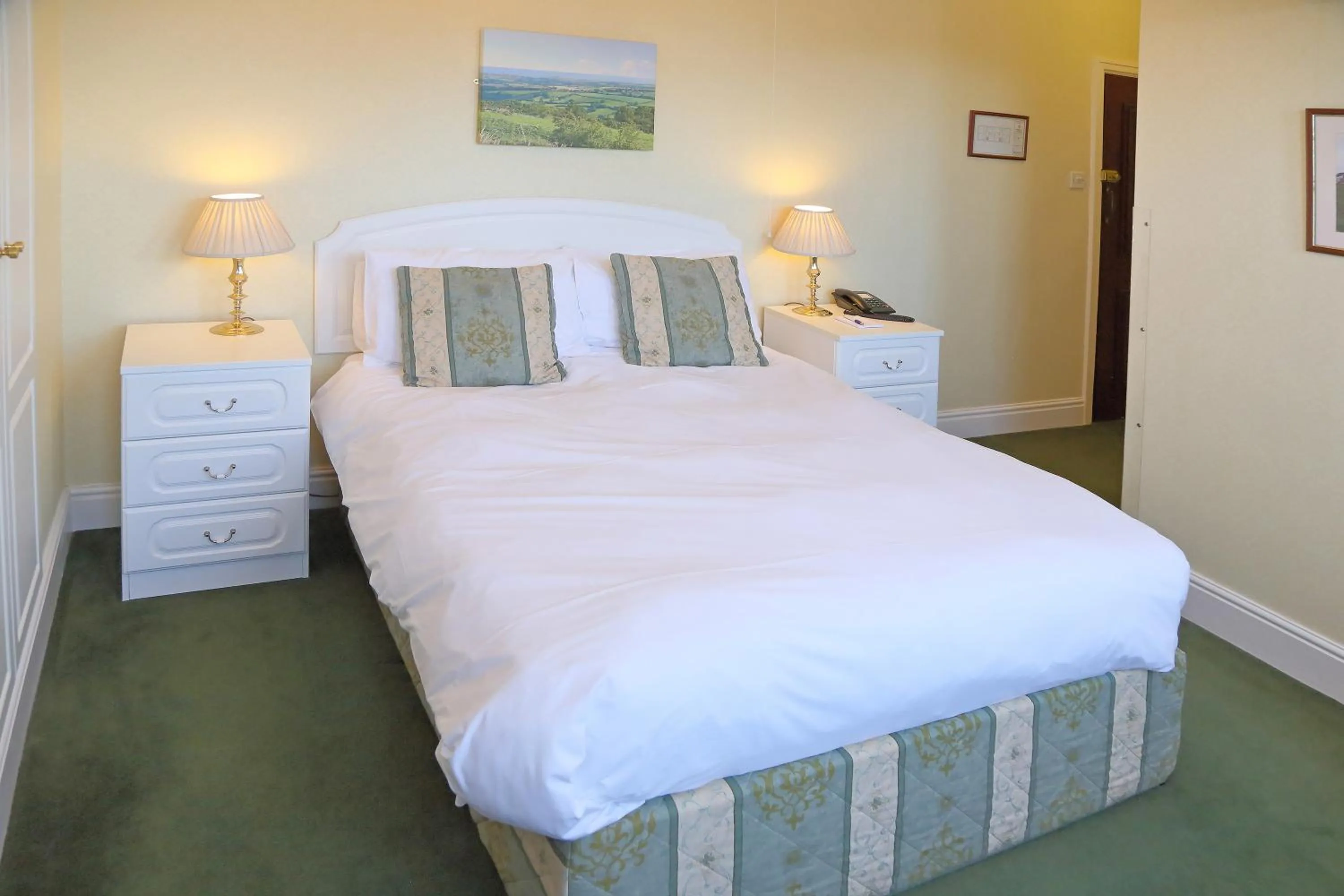 Bed in Saxonville Hotel