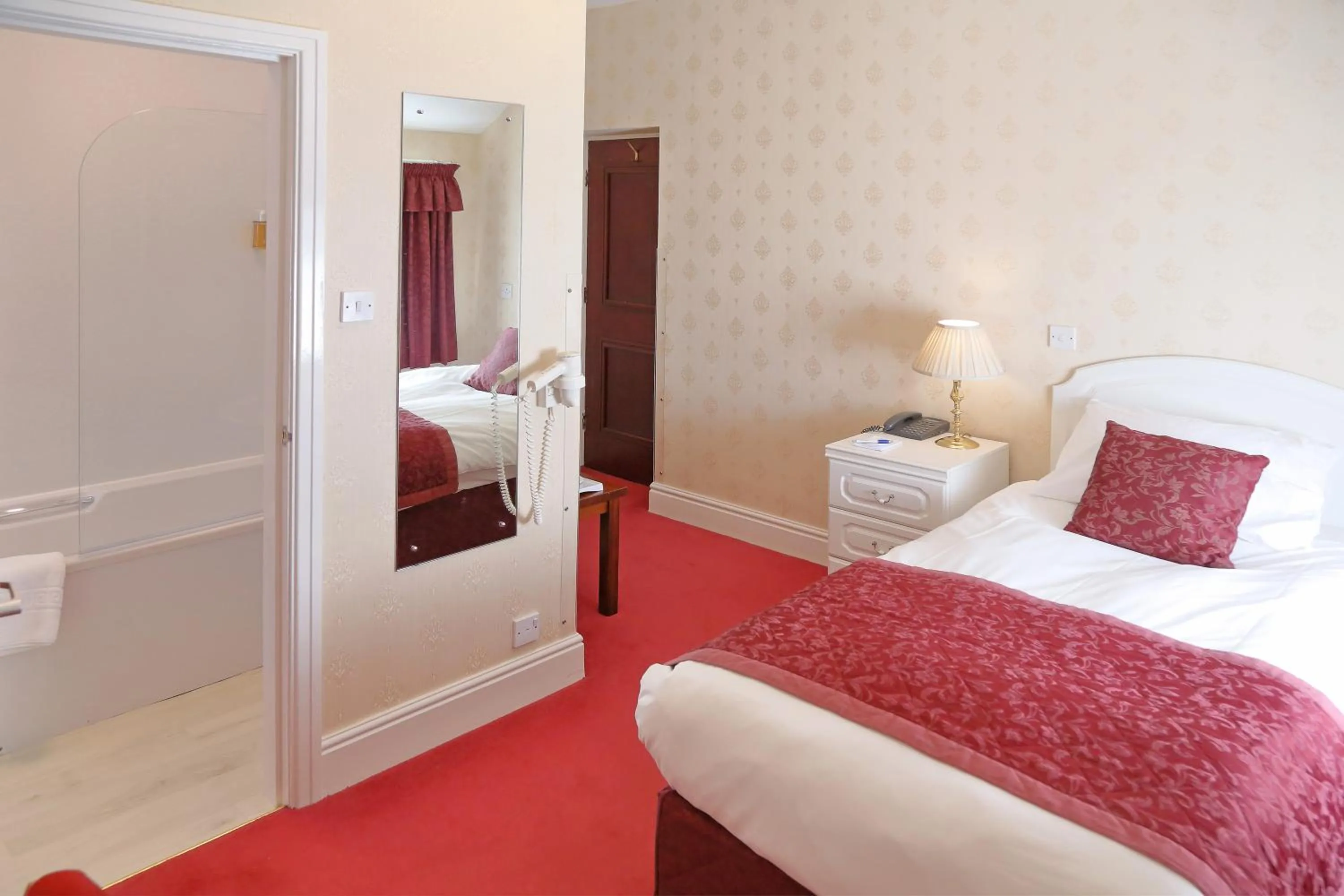 Bed in Saxonville Hotel