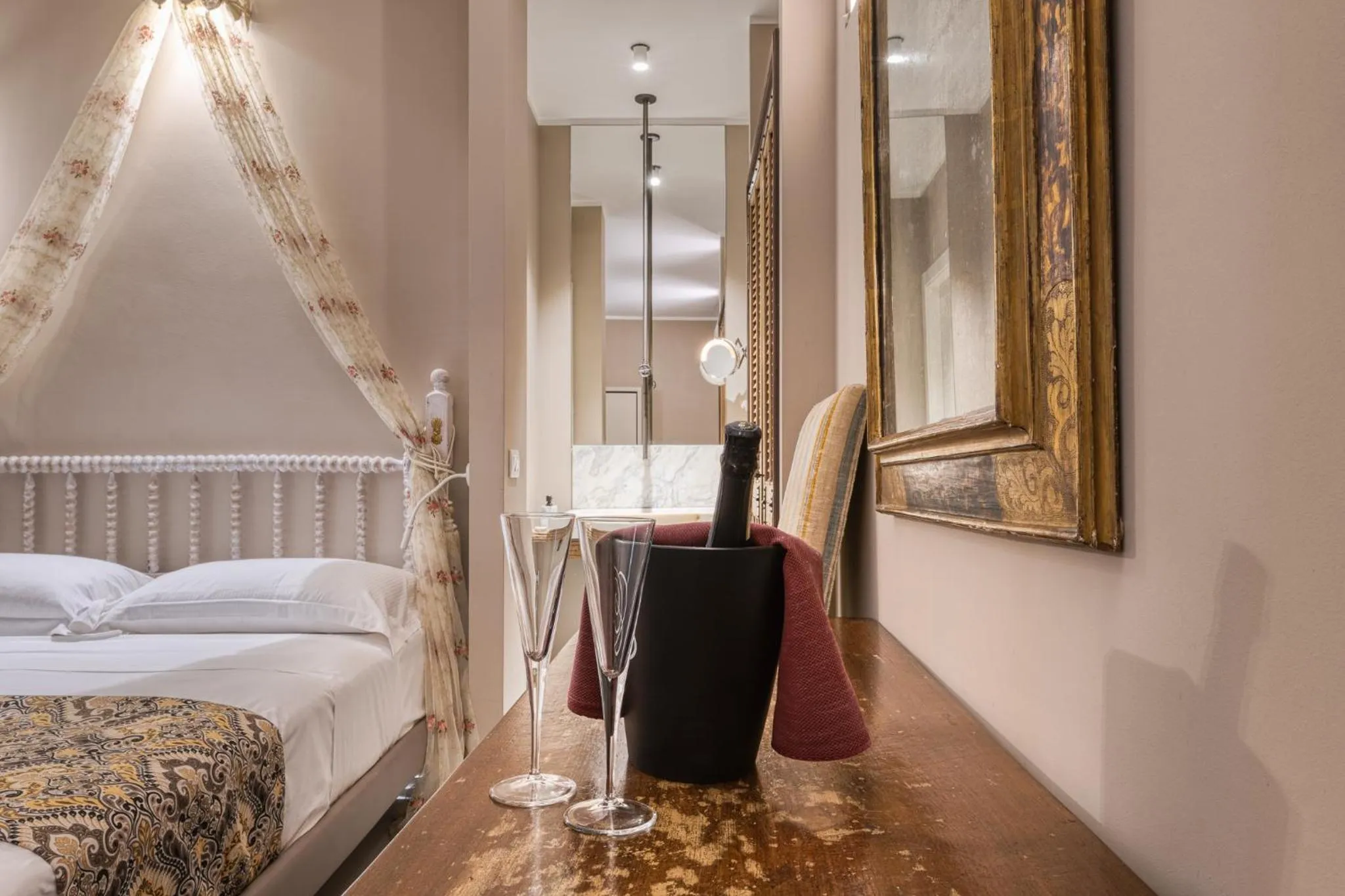 Bed in A'Mare Luxury Rooms