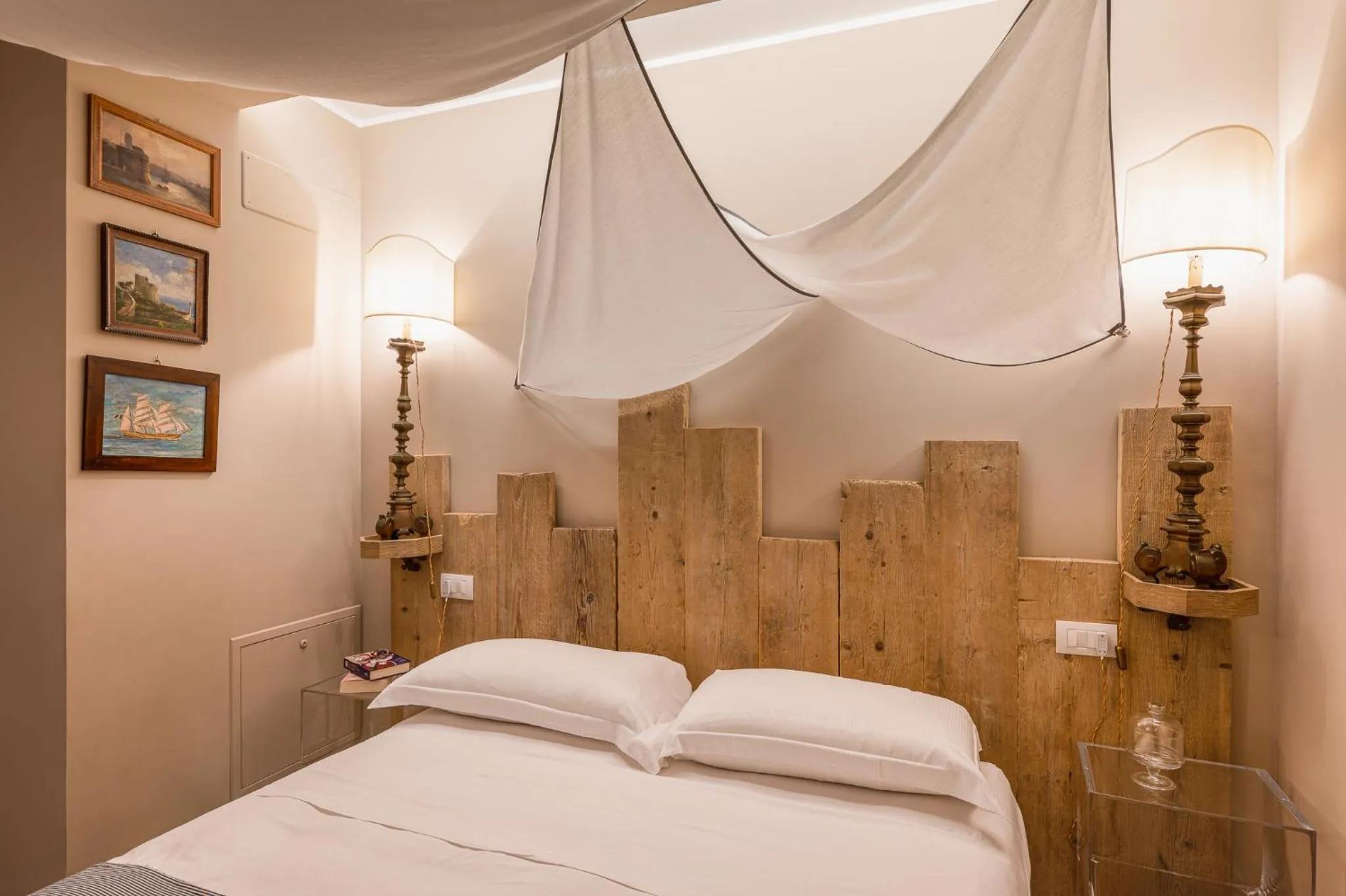 Bed in A'Mare Luxury Rooms