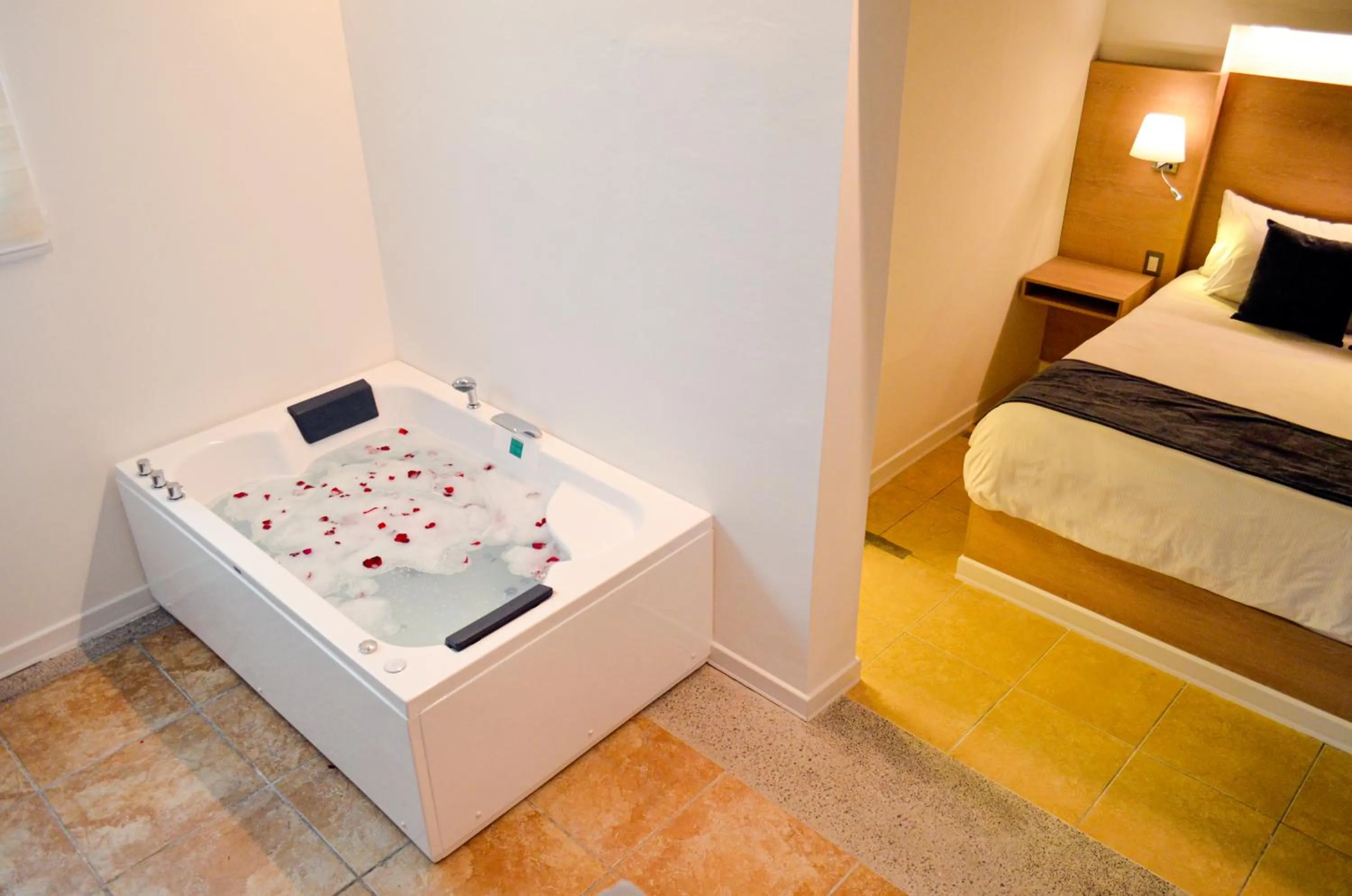 Bed in Casa Bella Boutique Hotel