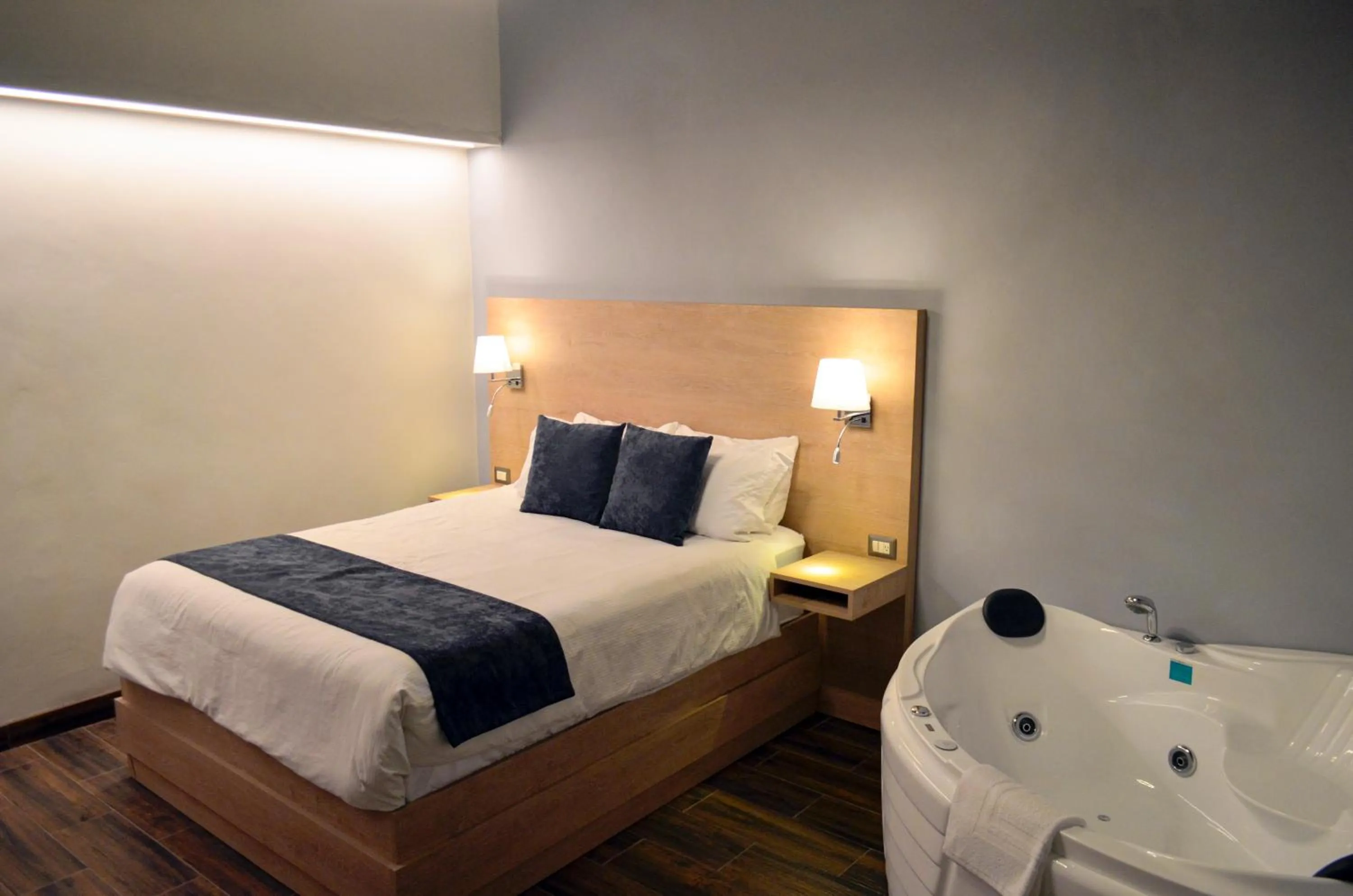 Bed in Casa Bella Boutique Hotel