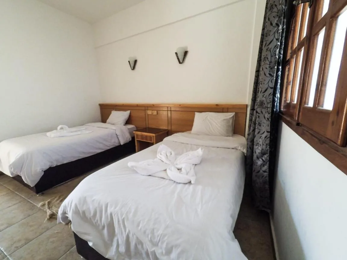 Bed in Jimmy Hotel