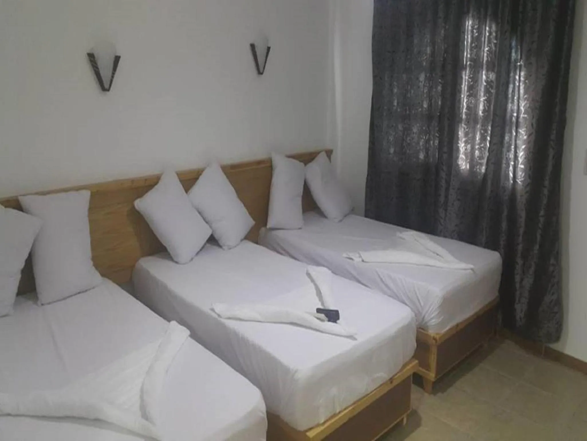 Bed in Jimmy Hotel