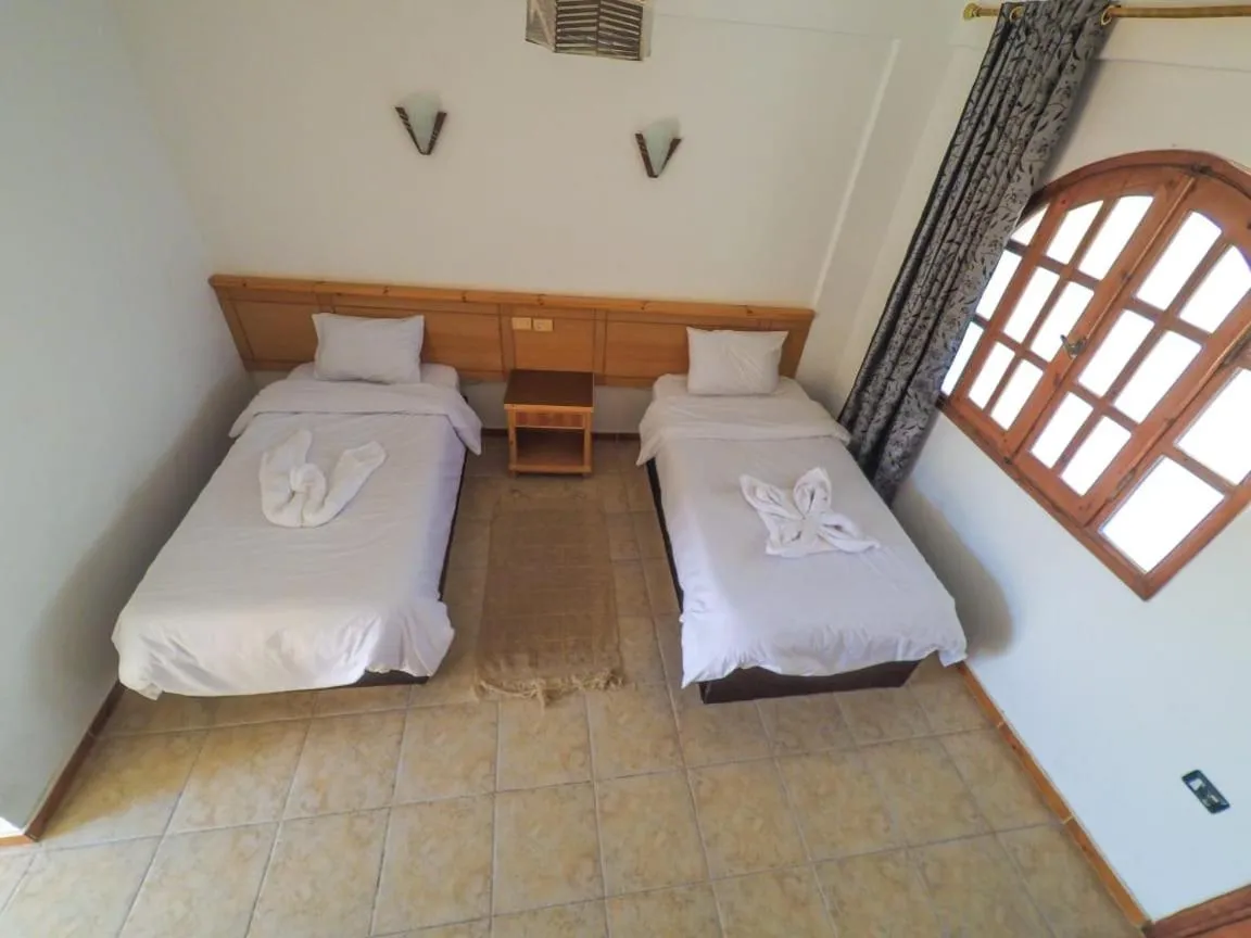 Bed in Jimmy Hotel