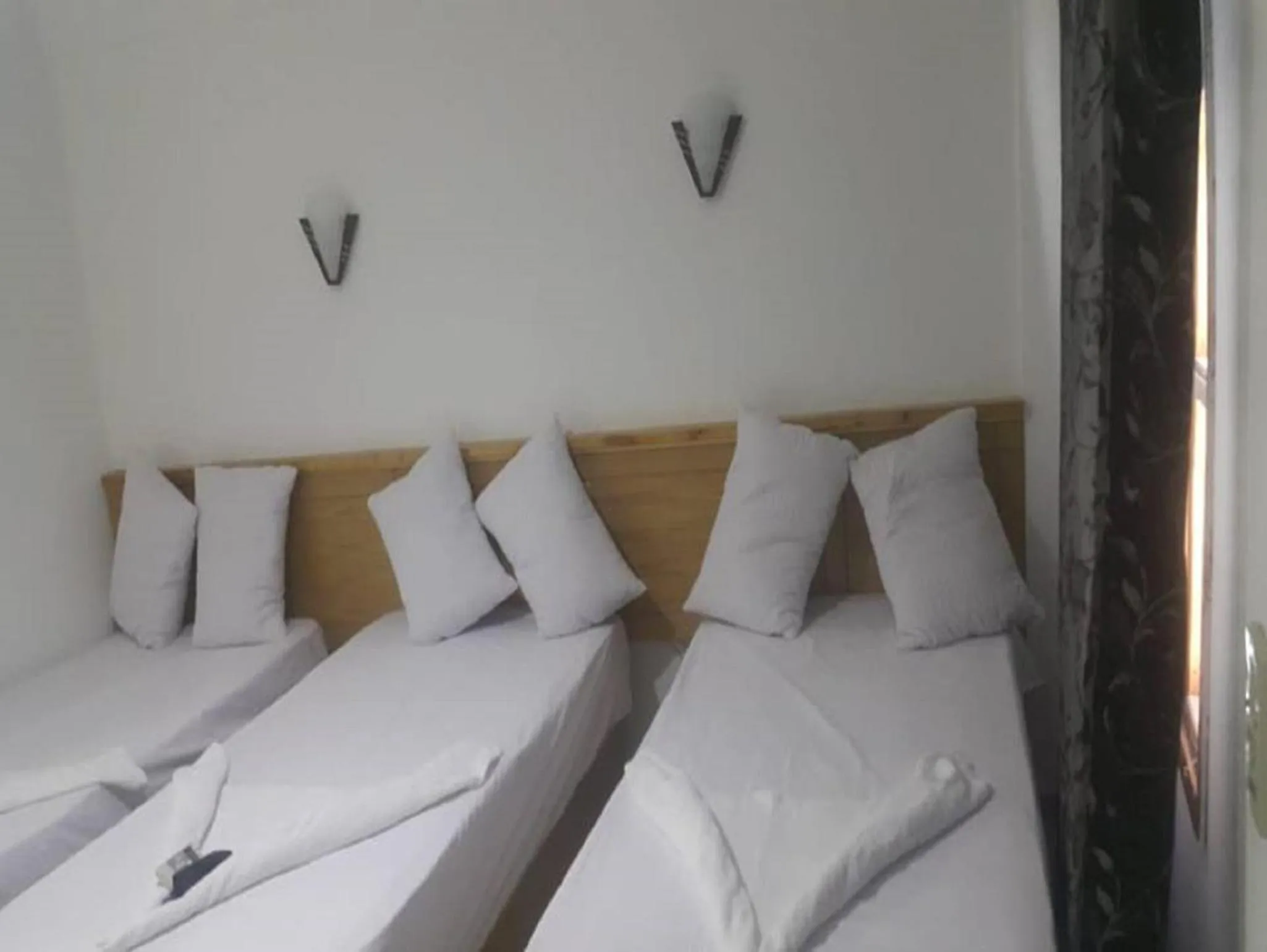 Bed in Jimmy Hotel