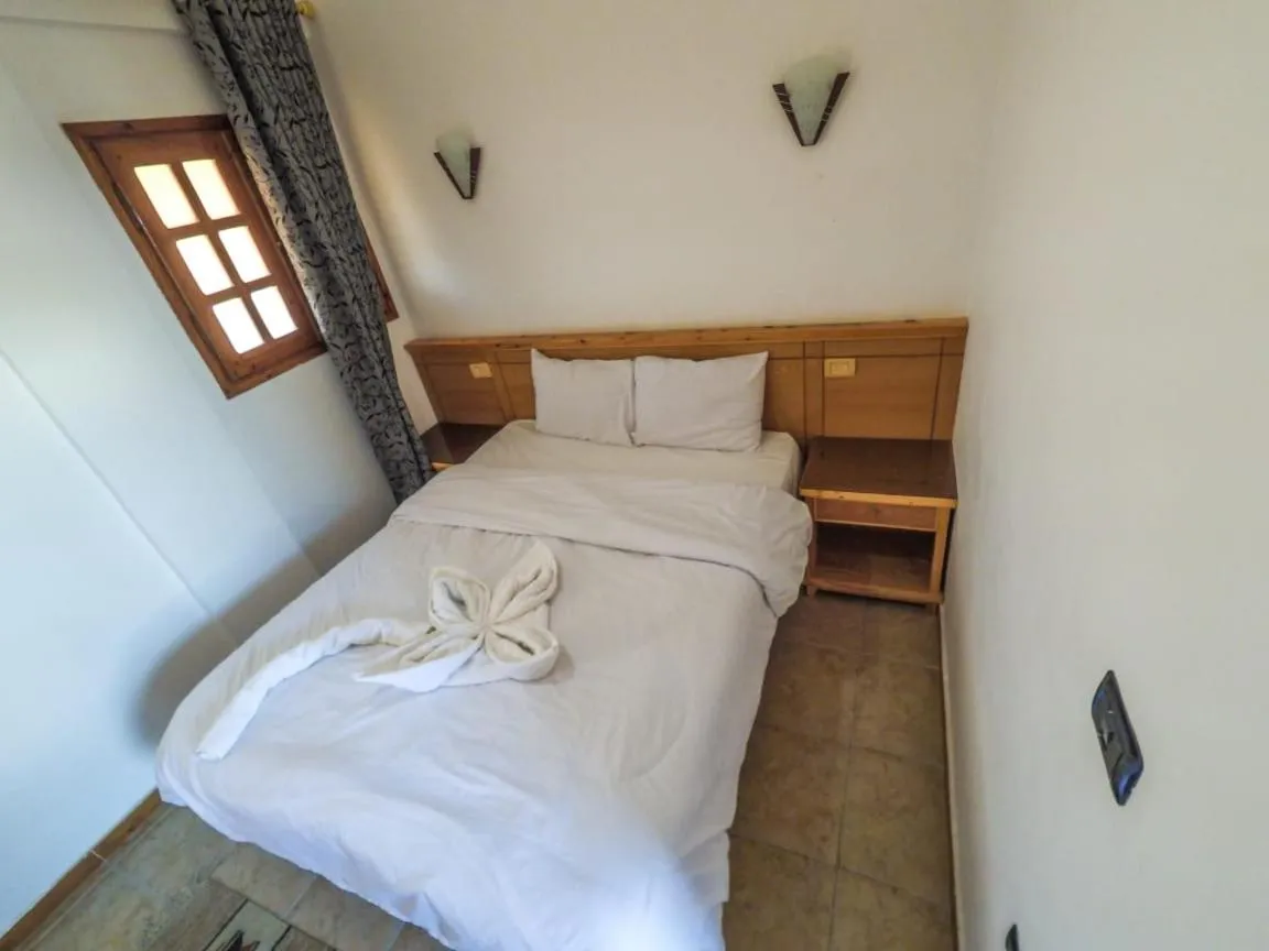 Bed in Jimmy Hotel