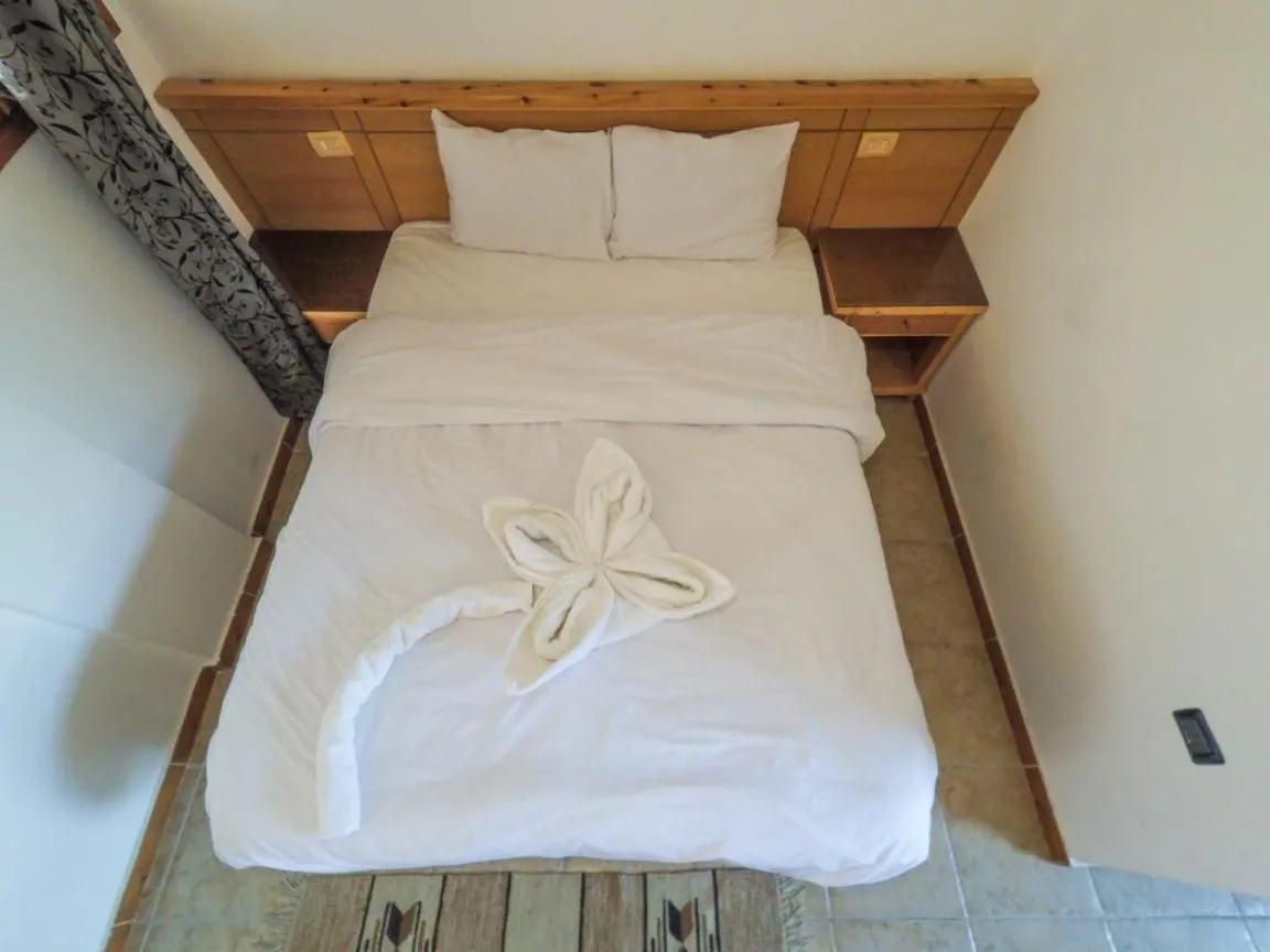 Bed in Jimmy Hotel