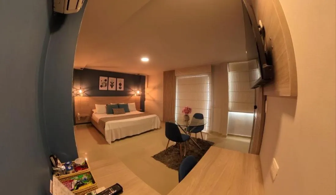 Communal lounge/ TV room, Bed in Hotel Quinta de Cabecera