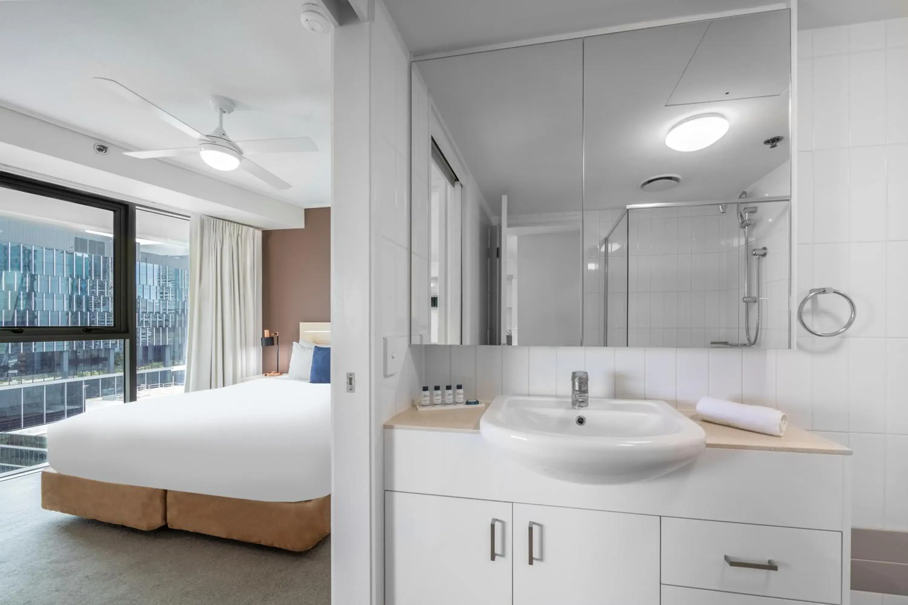 Bathroom, Bed in Oaks Brisbane on Felix Suites Bathroom, Bed in Oaks Brisbane on Felix Suites