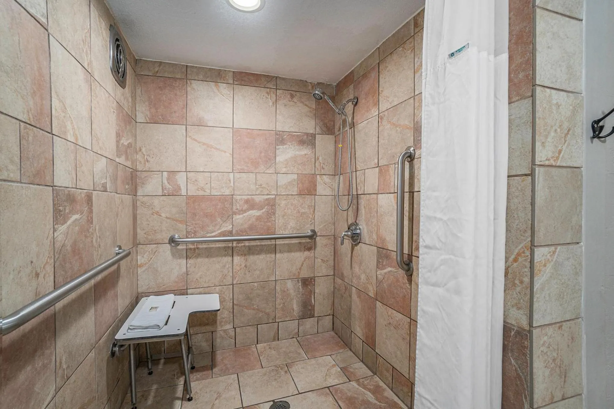 Shower in Travelodge by Wyndham Traverse City MI