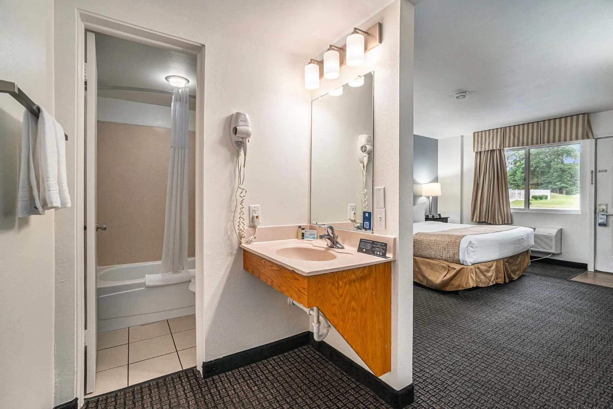 Bathroom in Travelodge by Wyndham Traverse City MI