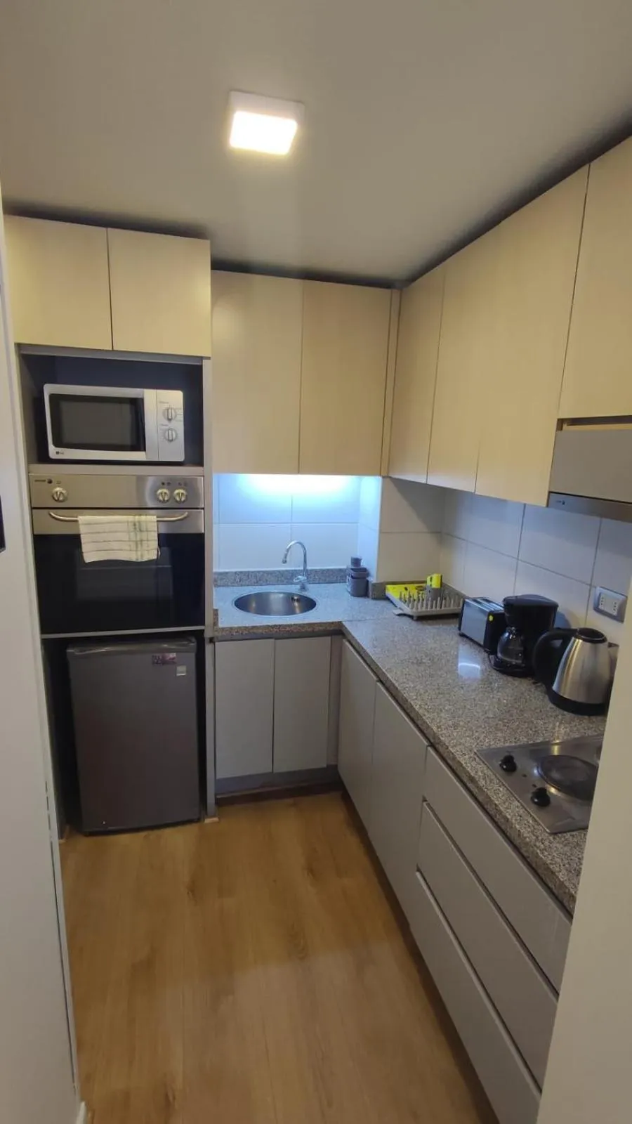 Kitchen or kitchenette in Apart Lyon Suite