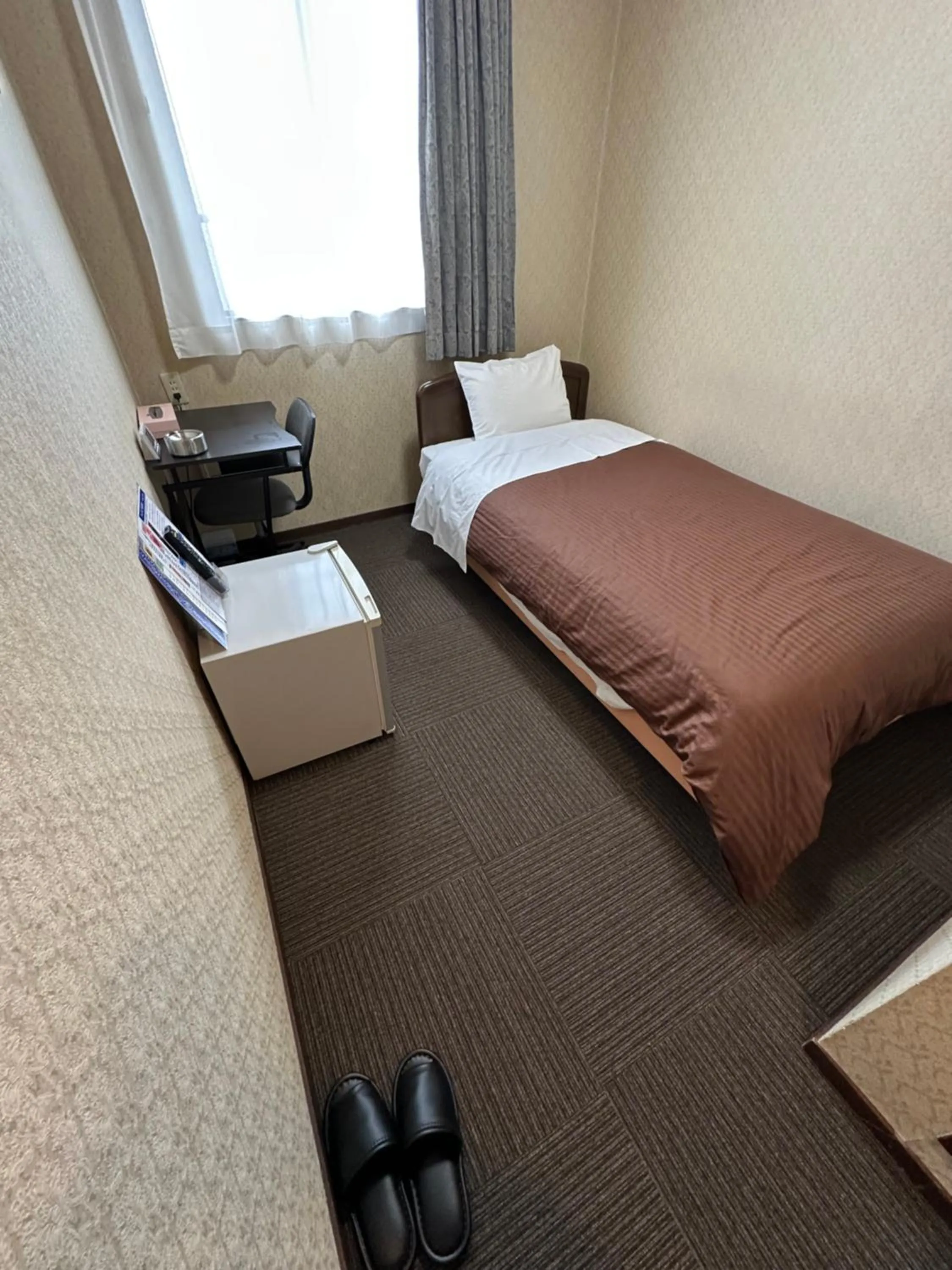Bed in Business Hotel Ishimura