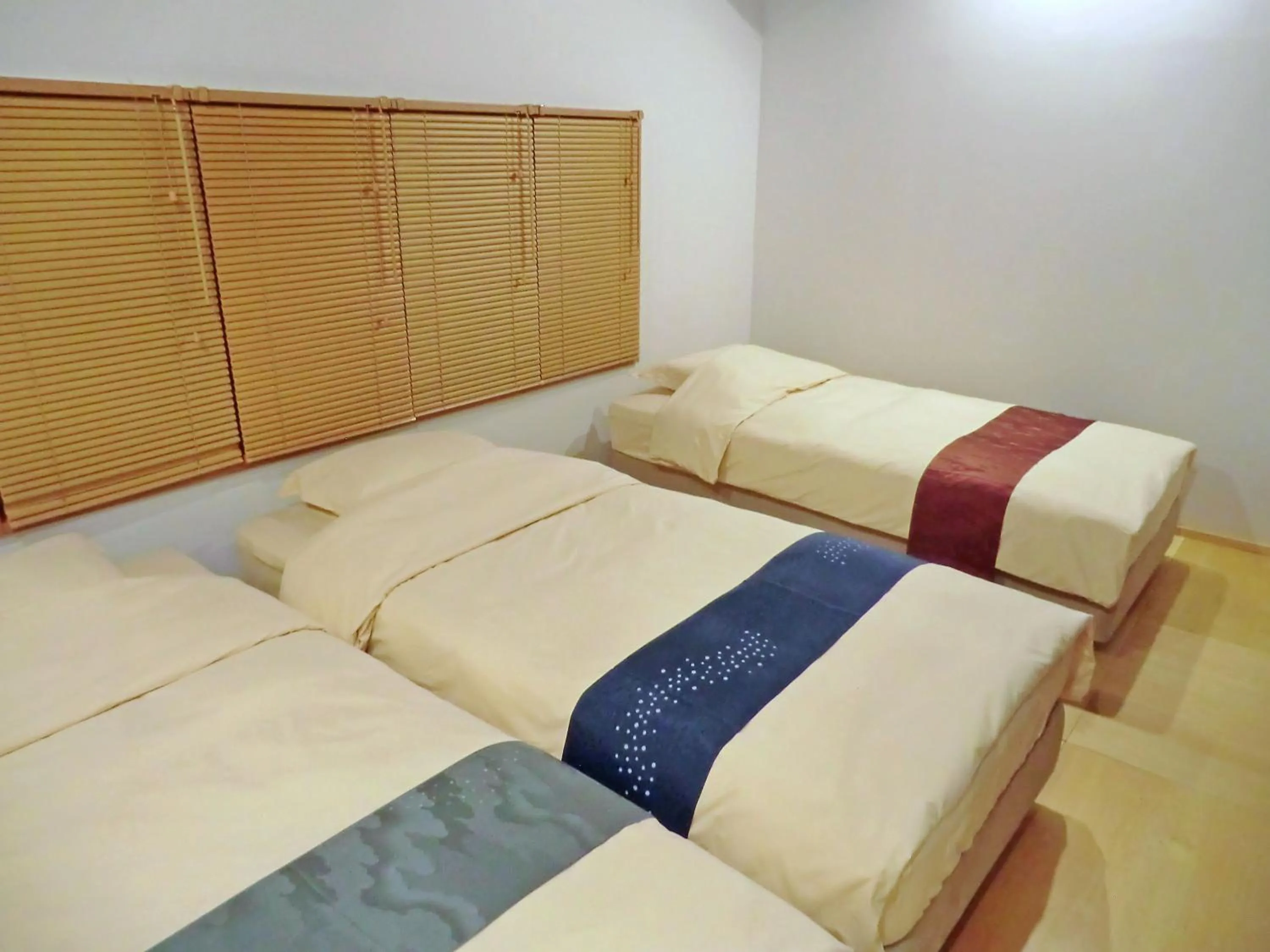 Bed in Machiya Hotel YANAGI