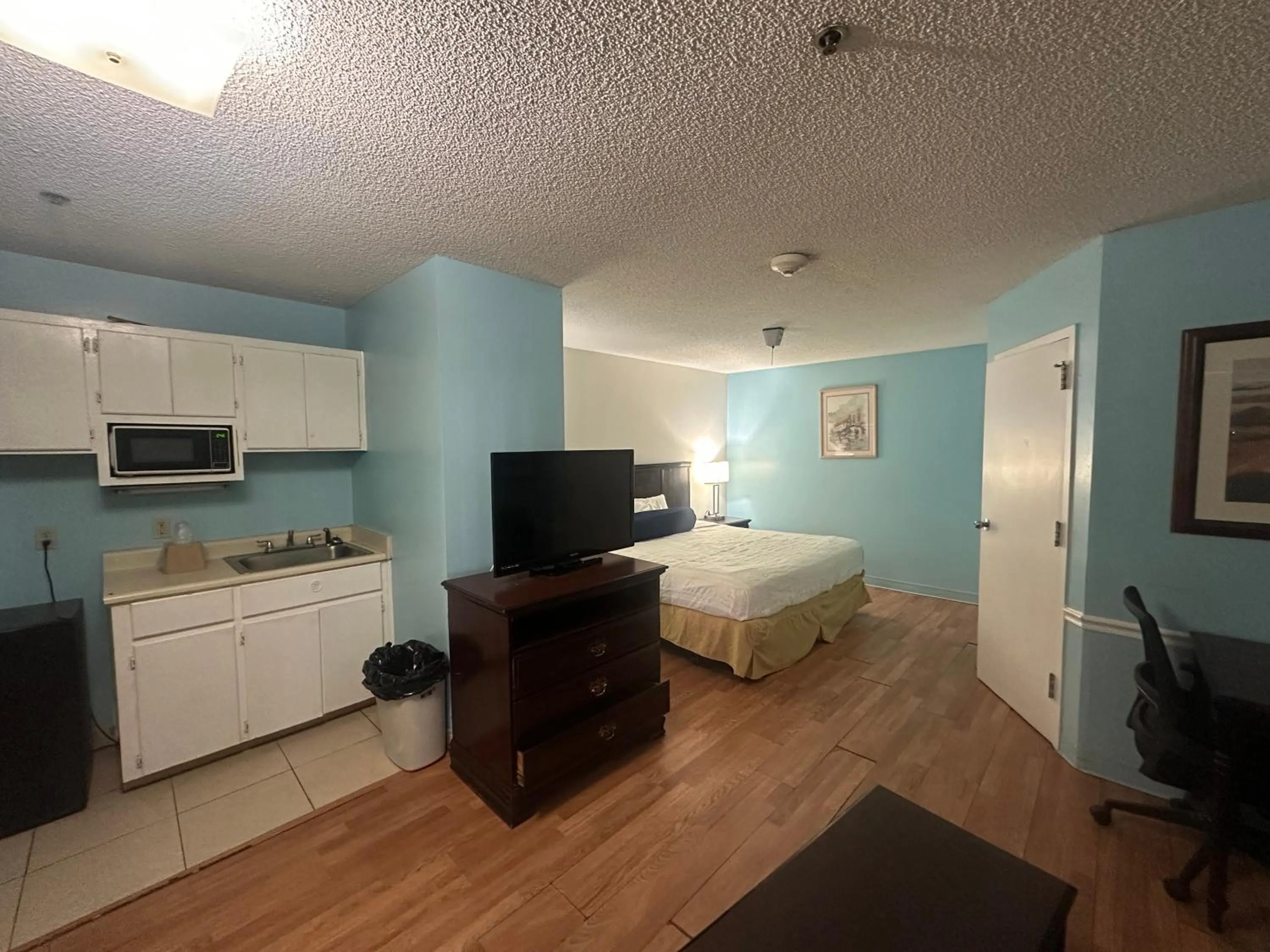 Bedroom in Guest Cottage & Suites By OYO Brunswick-Golden Isles