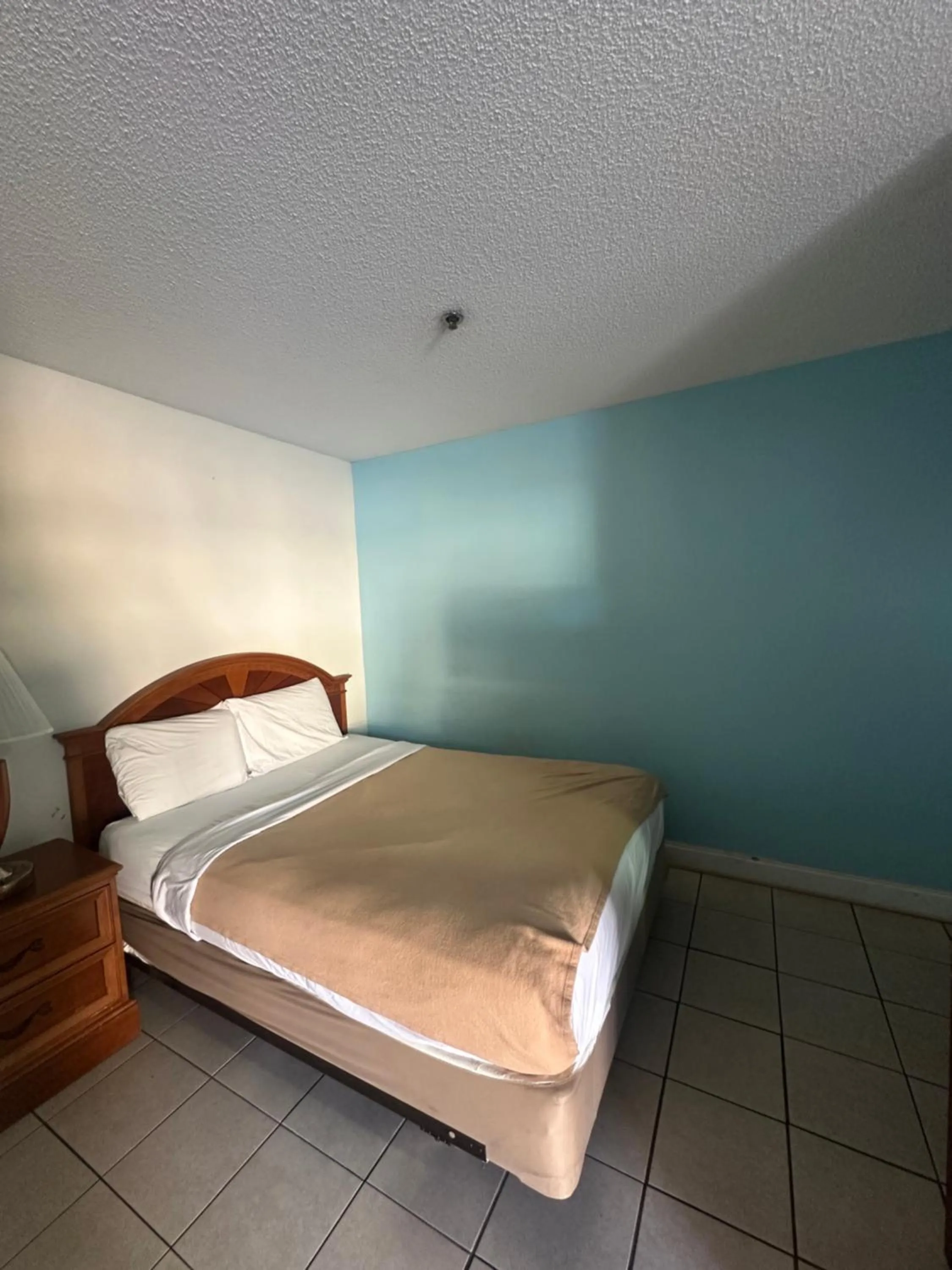 Bedroom in Guest Cottage & Suites By OYO Brunswick-Golden Isles