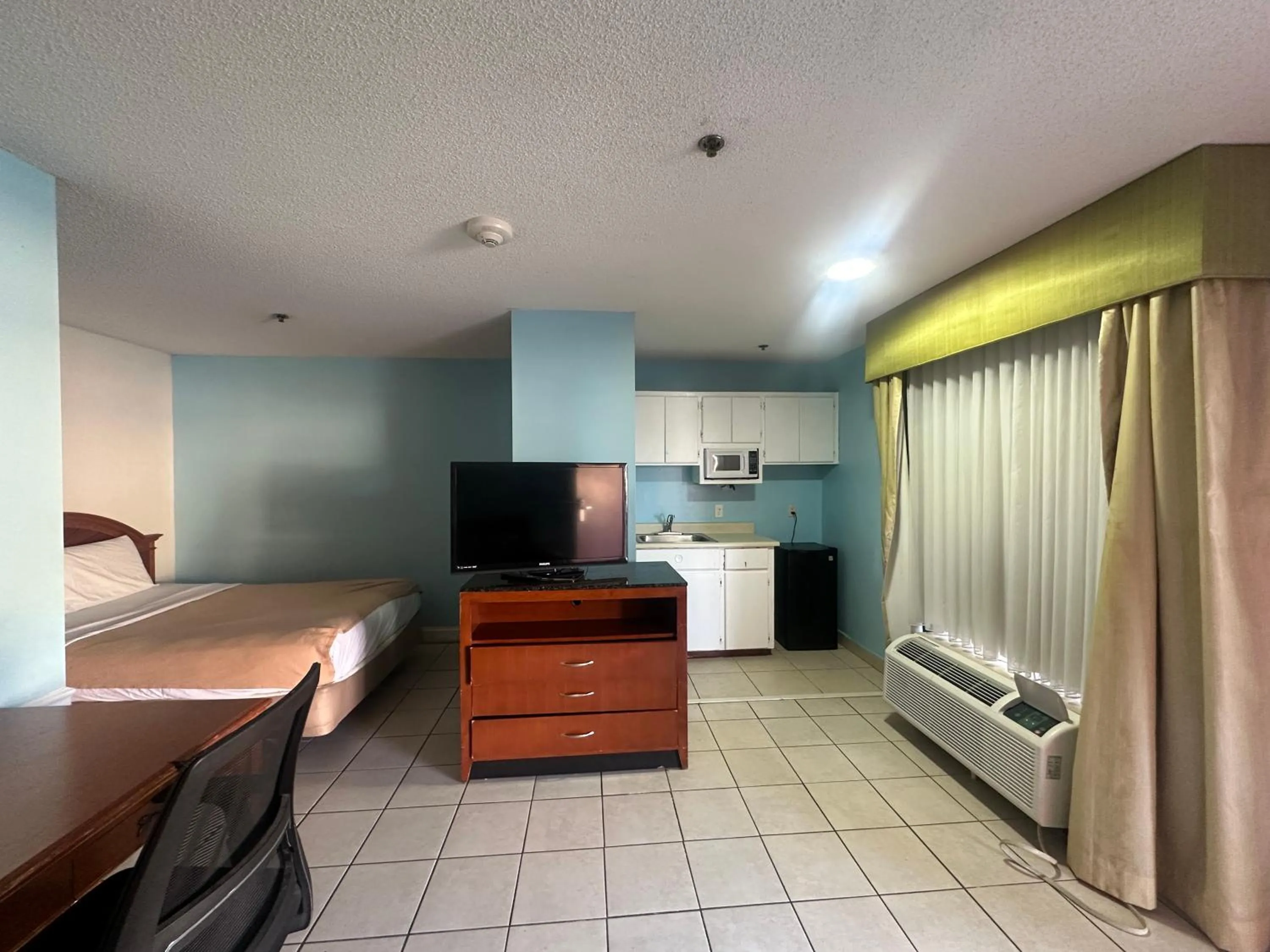 Bedroom in Guest Cottage & Suites By OYO Brunswick-Golden Isles