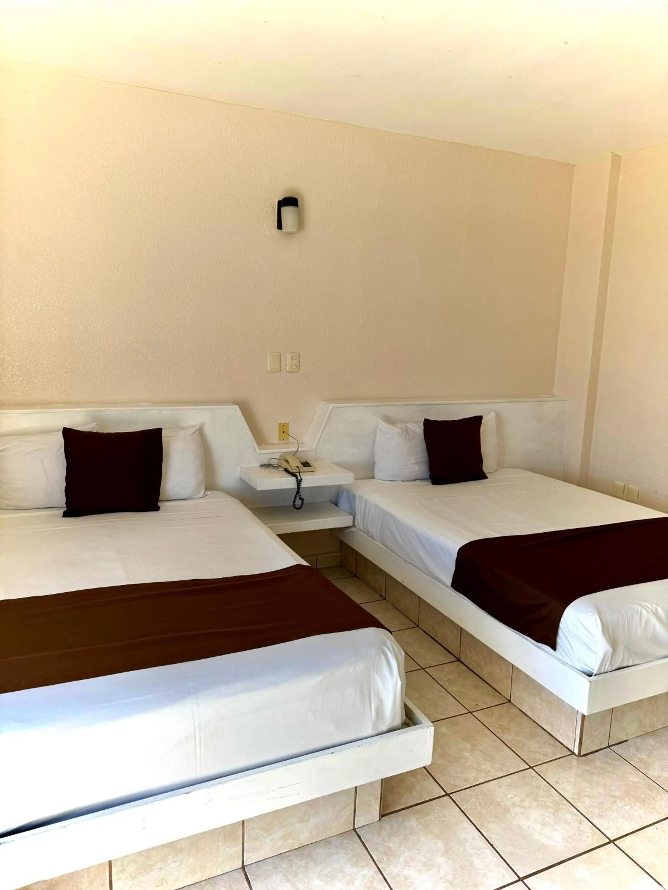 Photo of the whole room, Bed in Hotel María Eugenia Tuxtla Gutiérrez