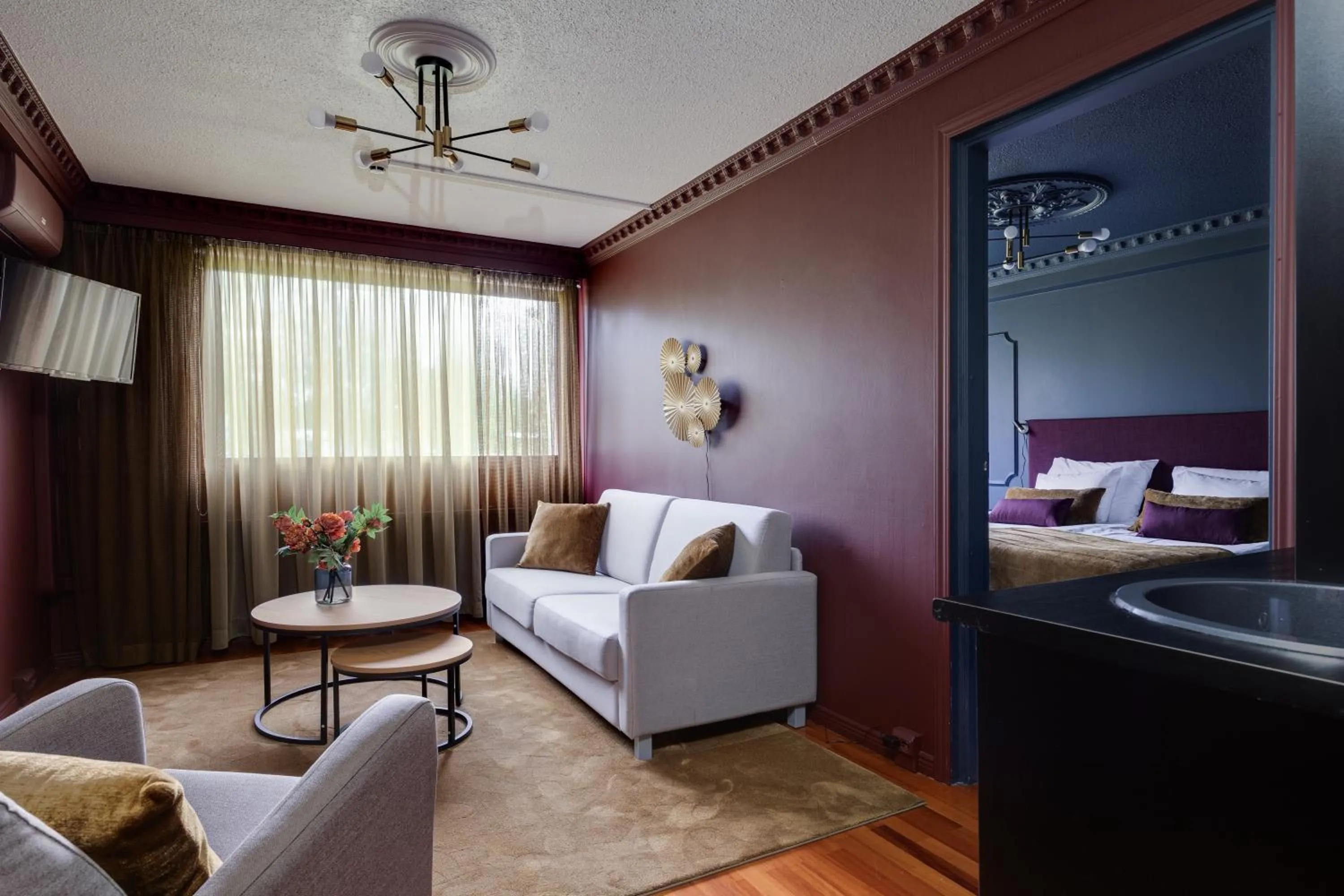 Living room, Bed in Hotel Käenpesä