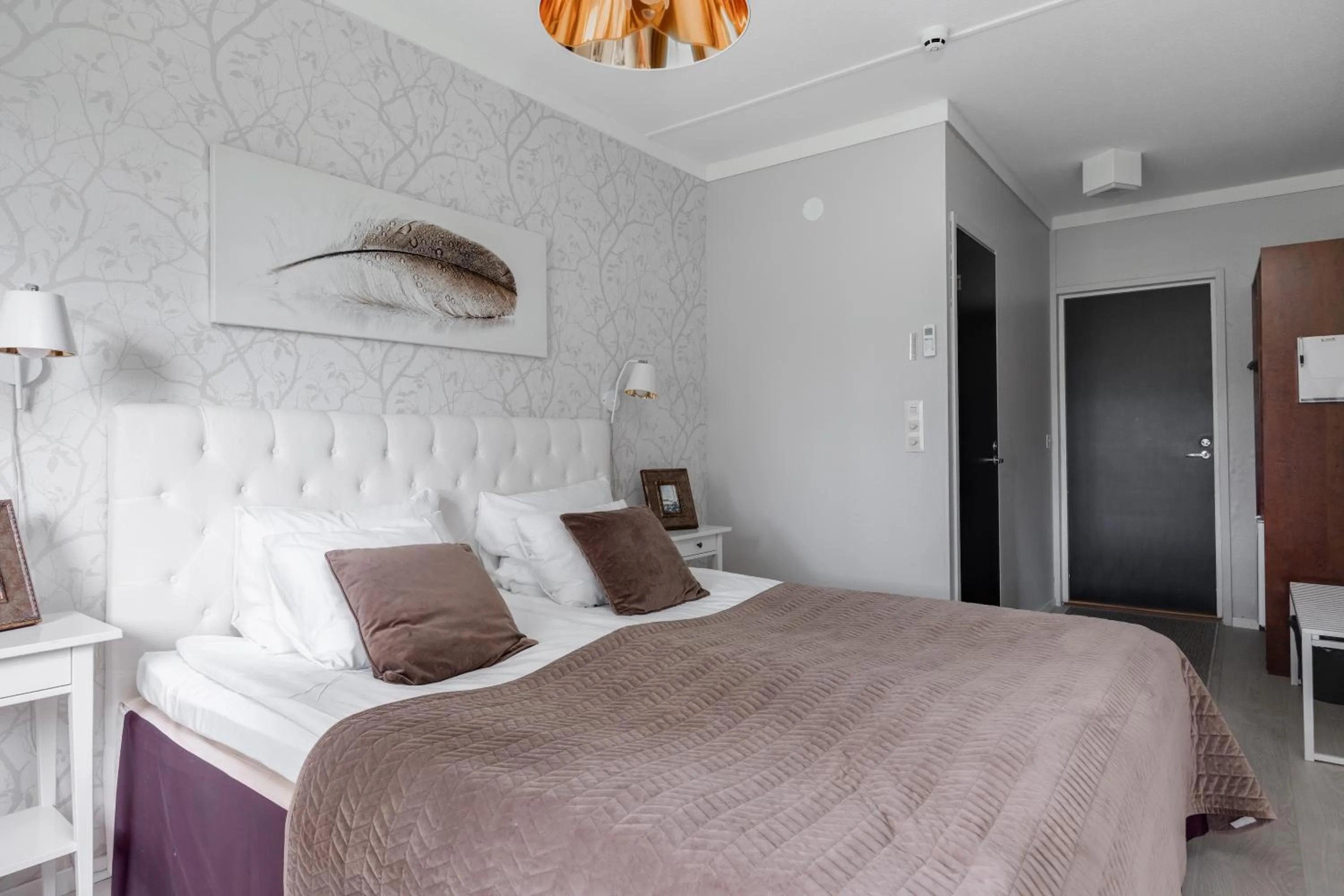 Bed in Hotel Käenpesä