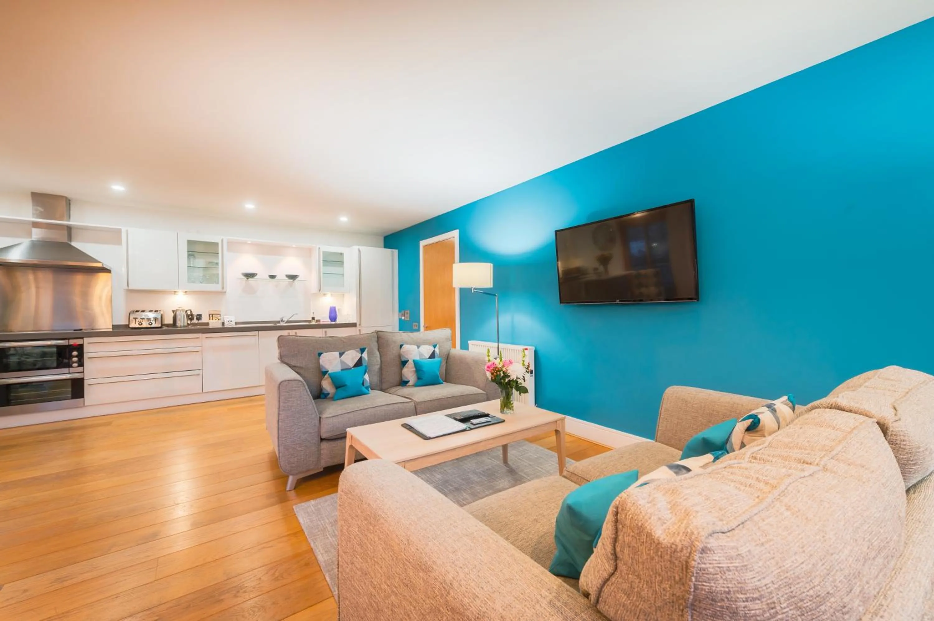 Living room in Highland Apartments by Mansley