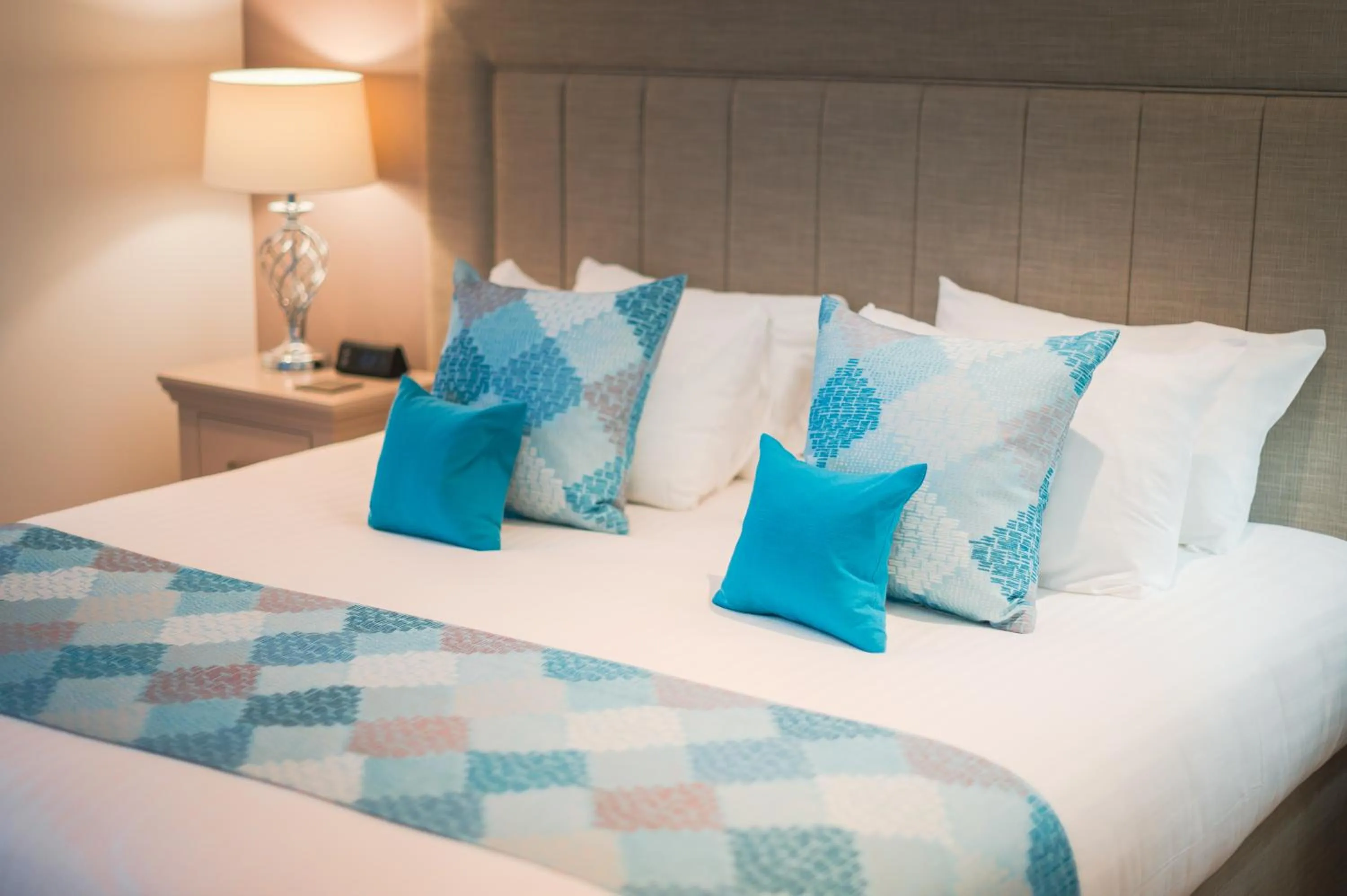 Bed in Highland Apartments by Mansley