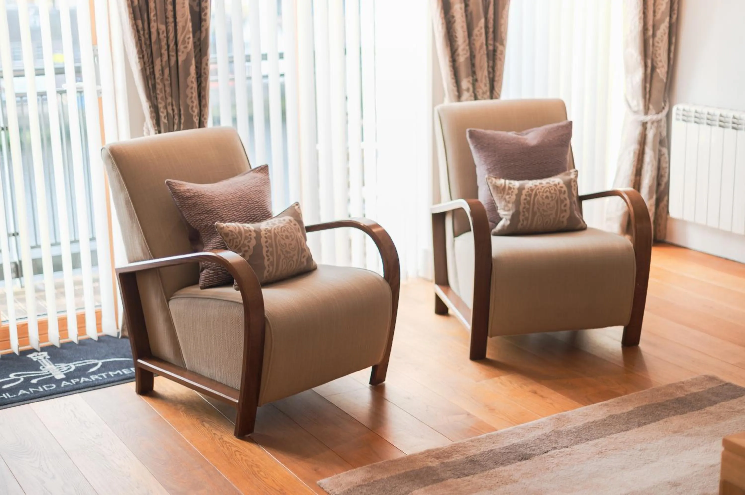Living room in Highland Apartments by Mansley