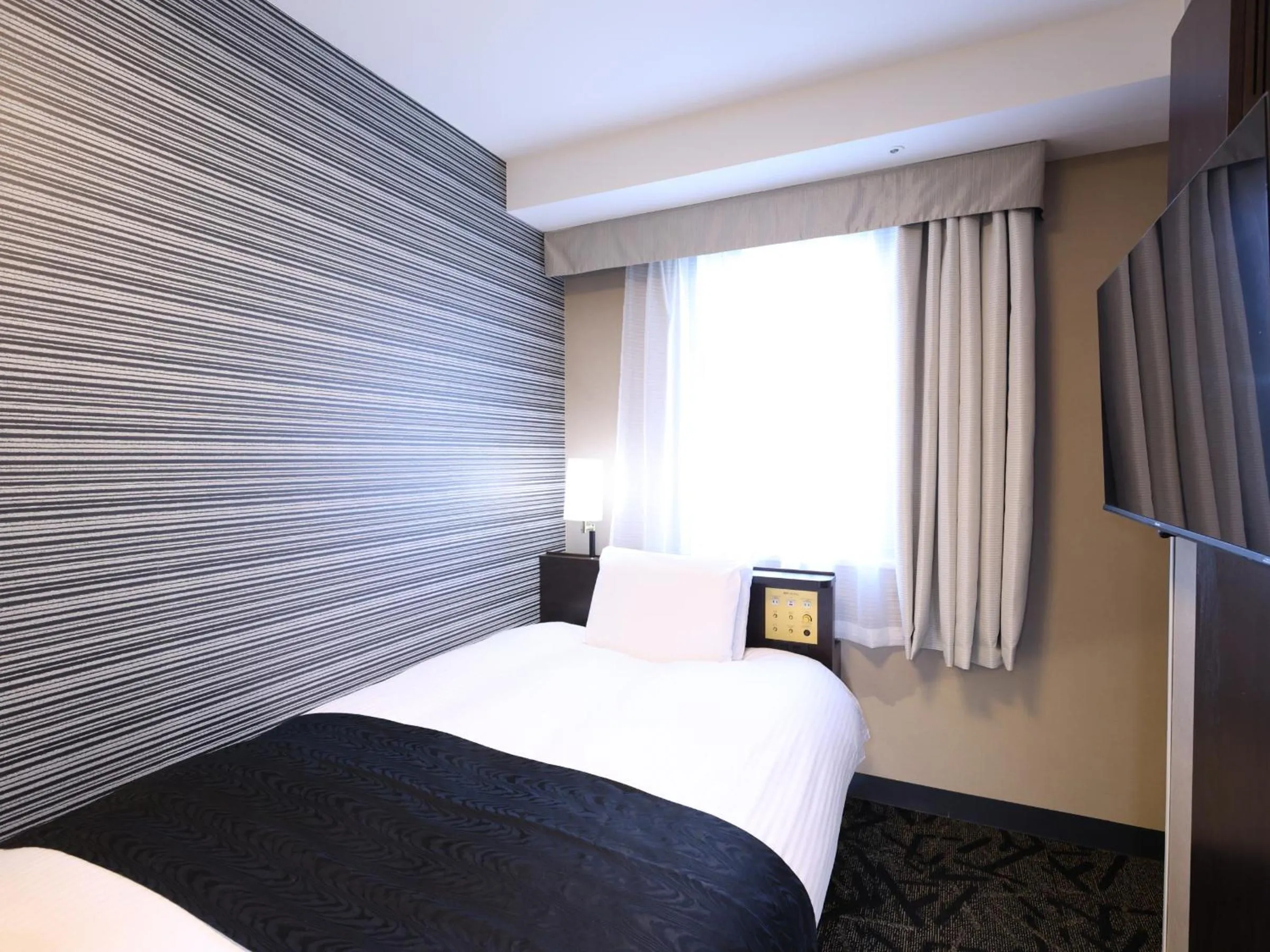 Photo of the whole room, Bed in APA Hotel Kanda Ekihigashi