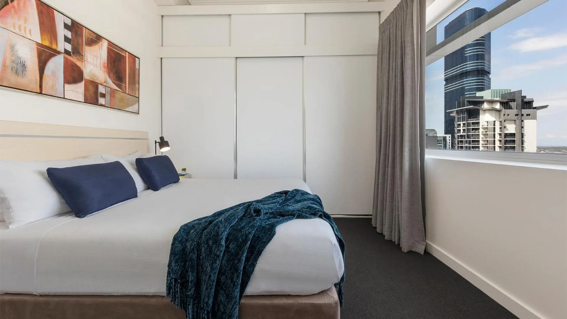 Bed in Oaks Brisbane Casino Tower Suites