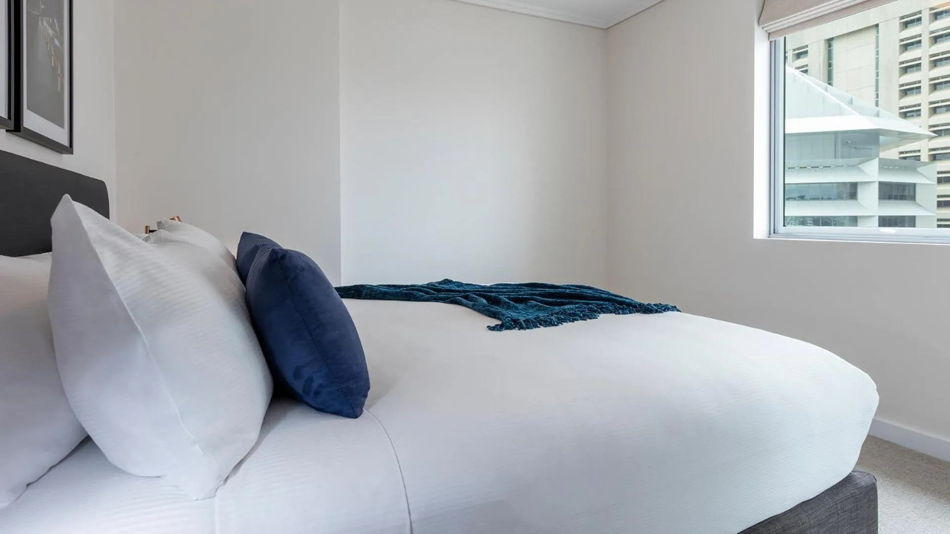 Bed in Oaks Brisbane Casino Tower Suites