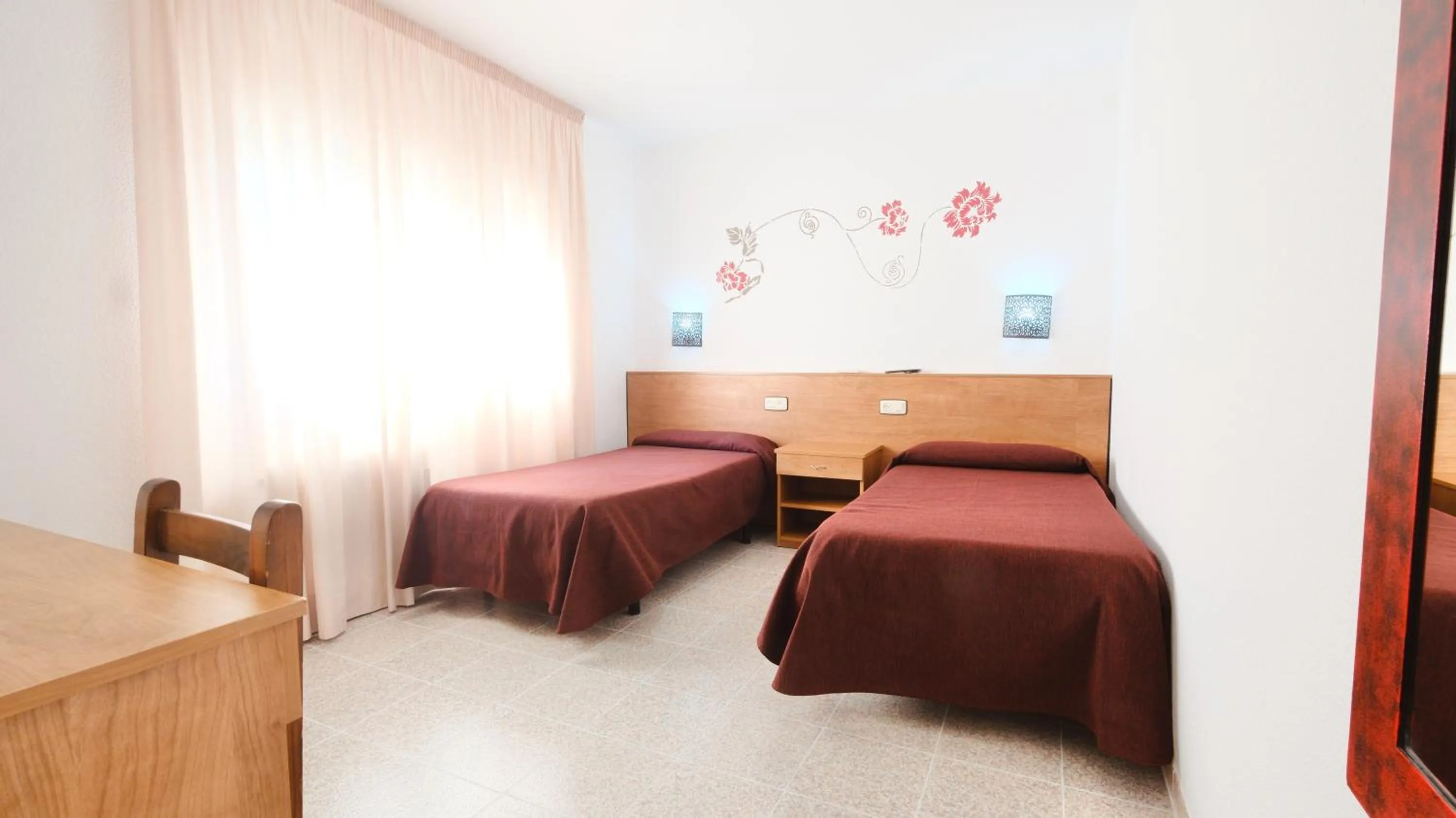 Bed in Hotel Paradís