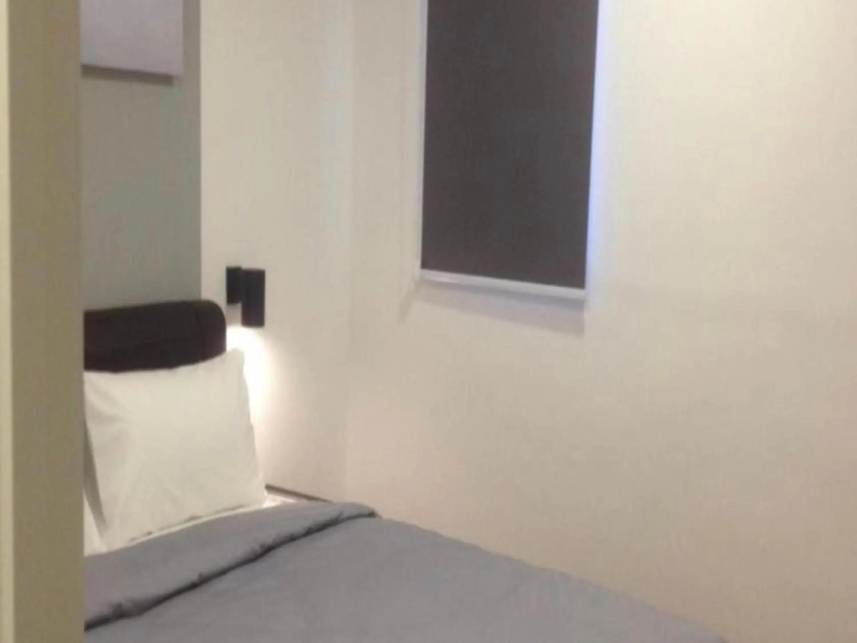 Bedroom in OYO 89492 Carlton Inn Bukit Ubi Bedroom in OYO 89492 Carlton Inn Bukit Ubi