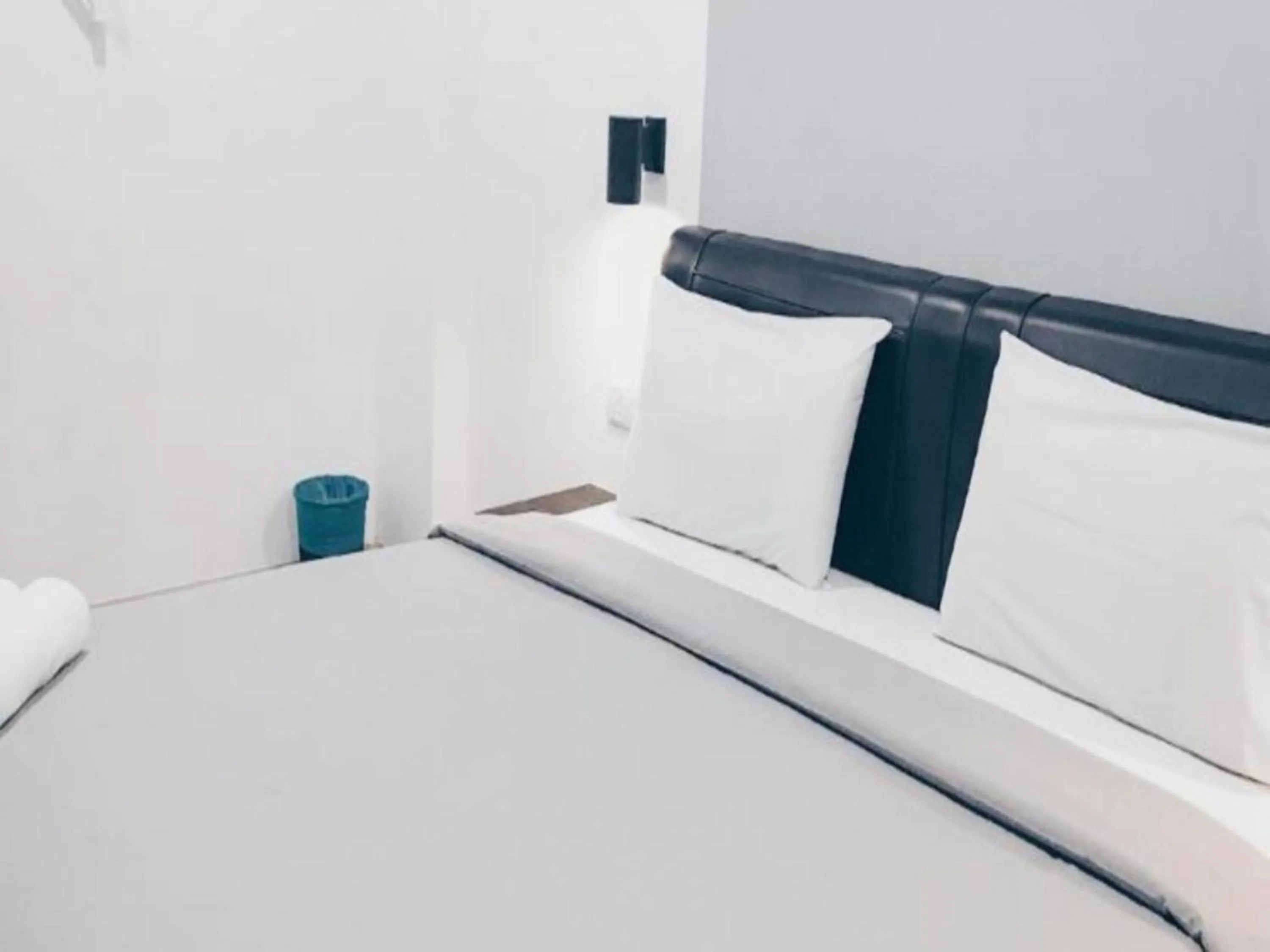 Bedroom in OYO 89492 Carlton Inn Bukit Ubi