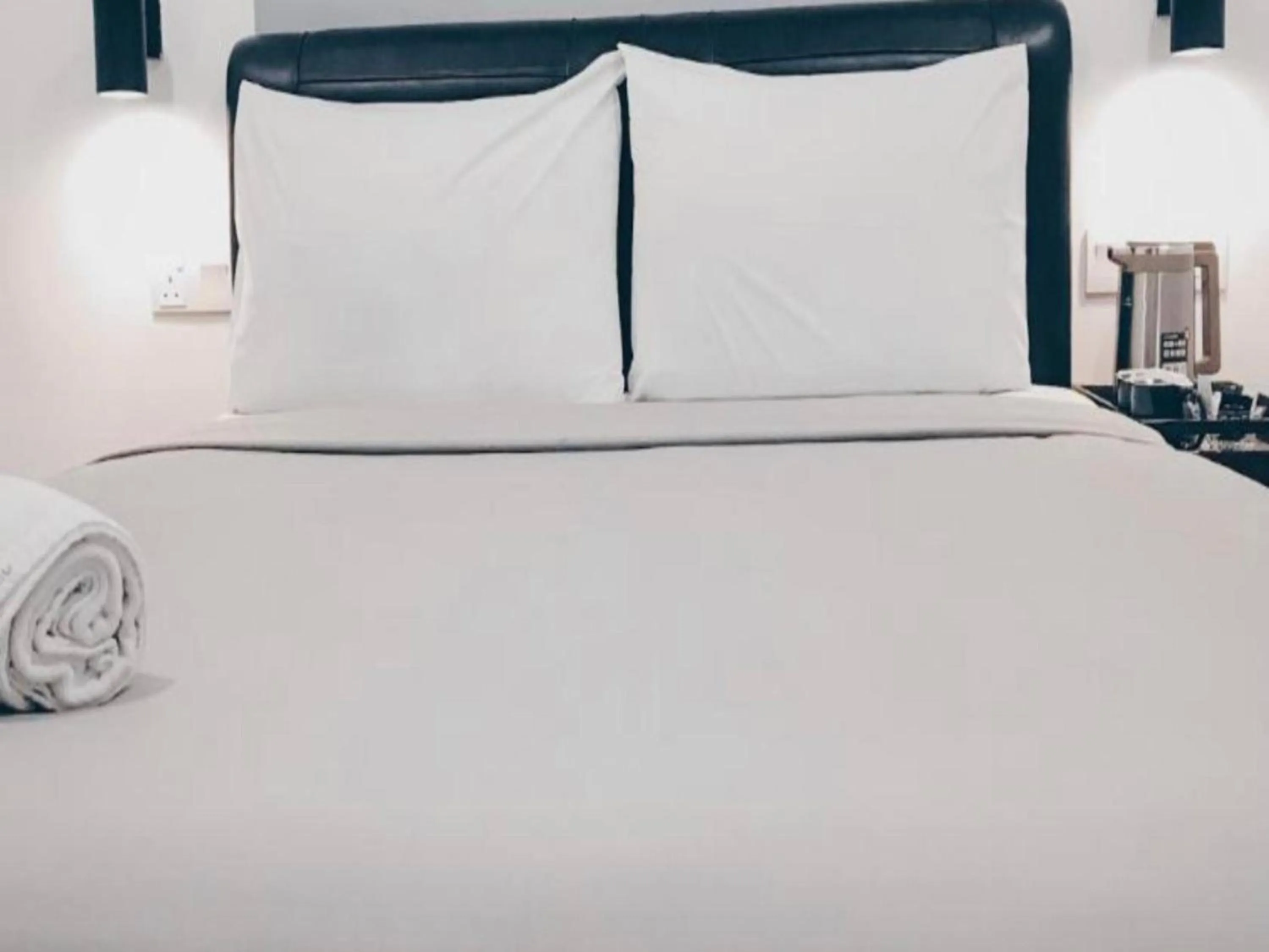 Bedroom in OYO 89492 Carlton Inn Bukit Ubi