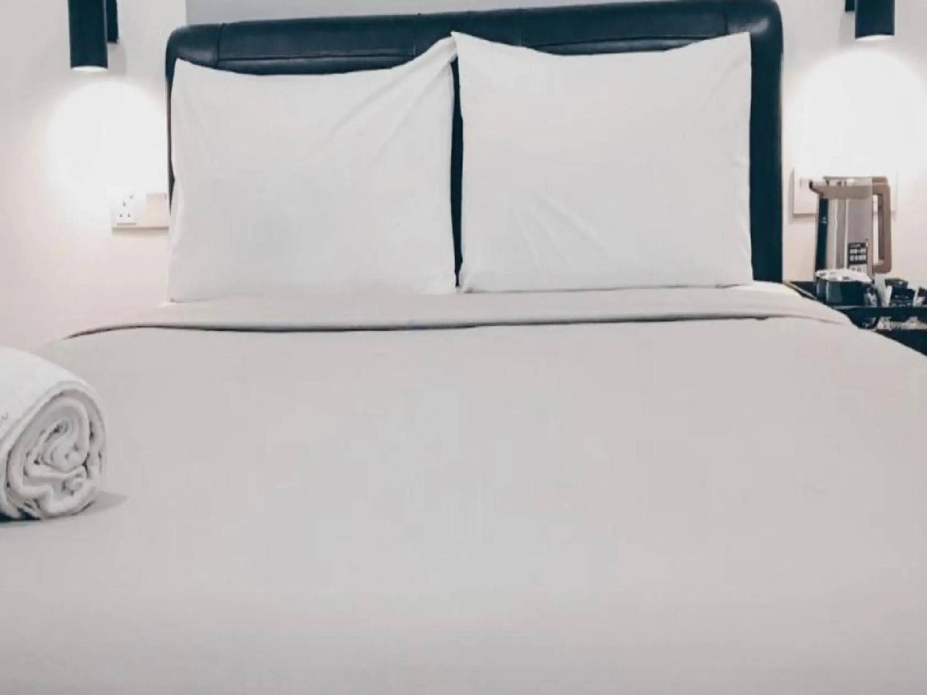 Bedroom in OYO 89492 Carlton Inn Bukit Ubi Bedroom in OYO 89492 Carlton Inn Bukit Ubi