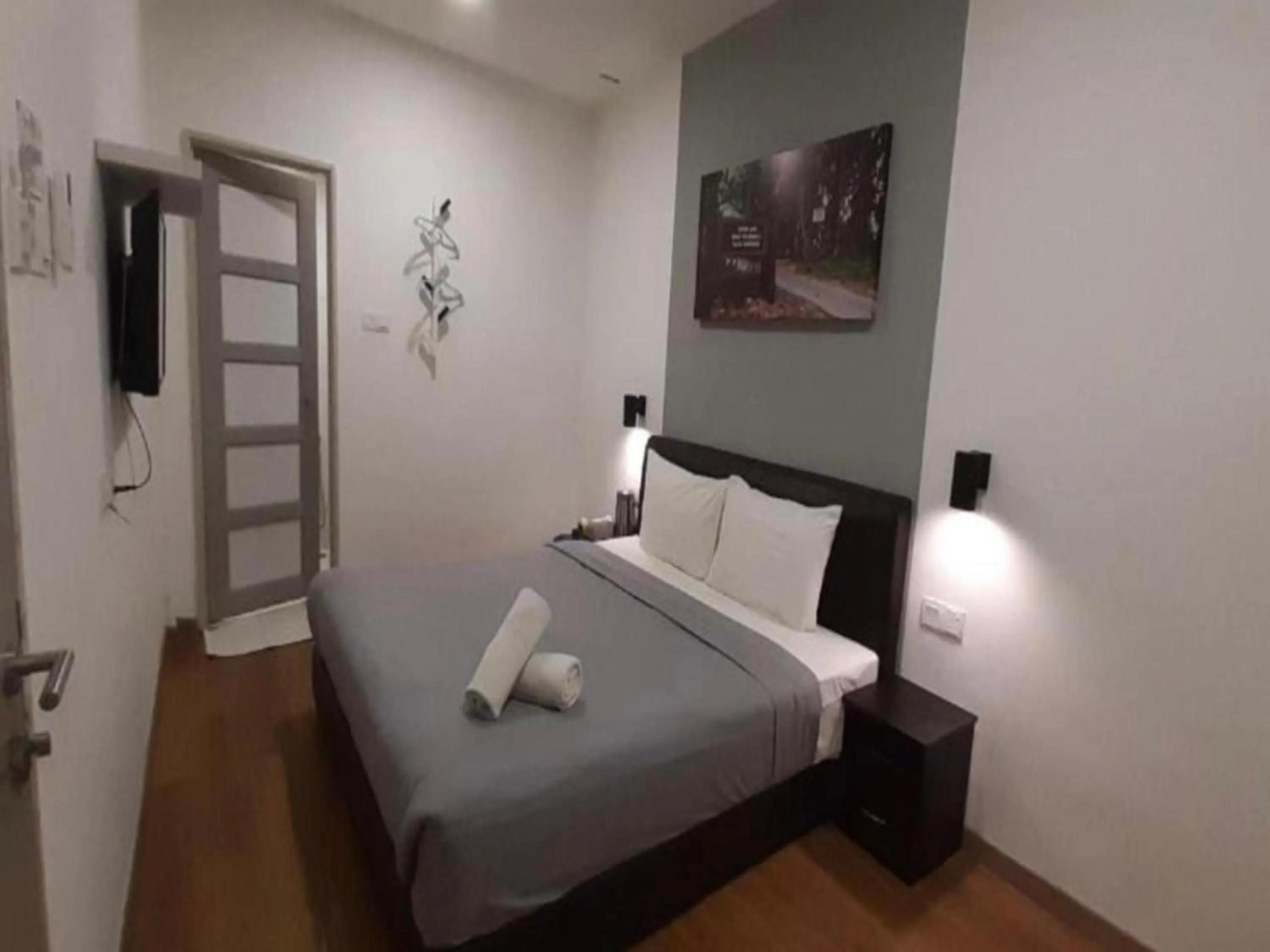 Bedroom in OYO 89492 Carlton Inn Bukit Ubi