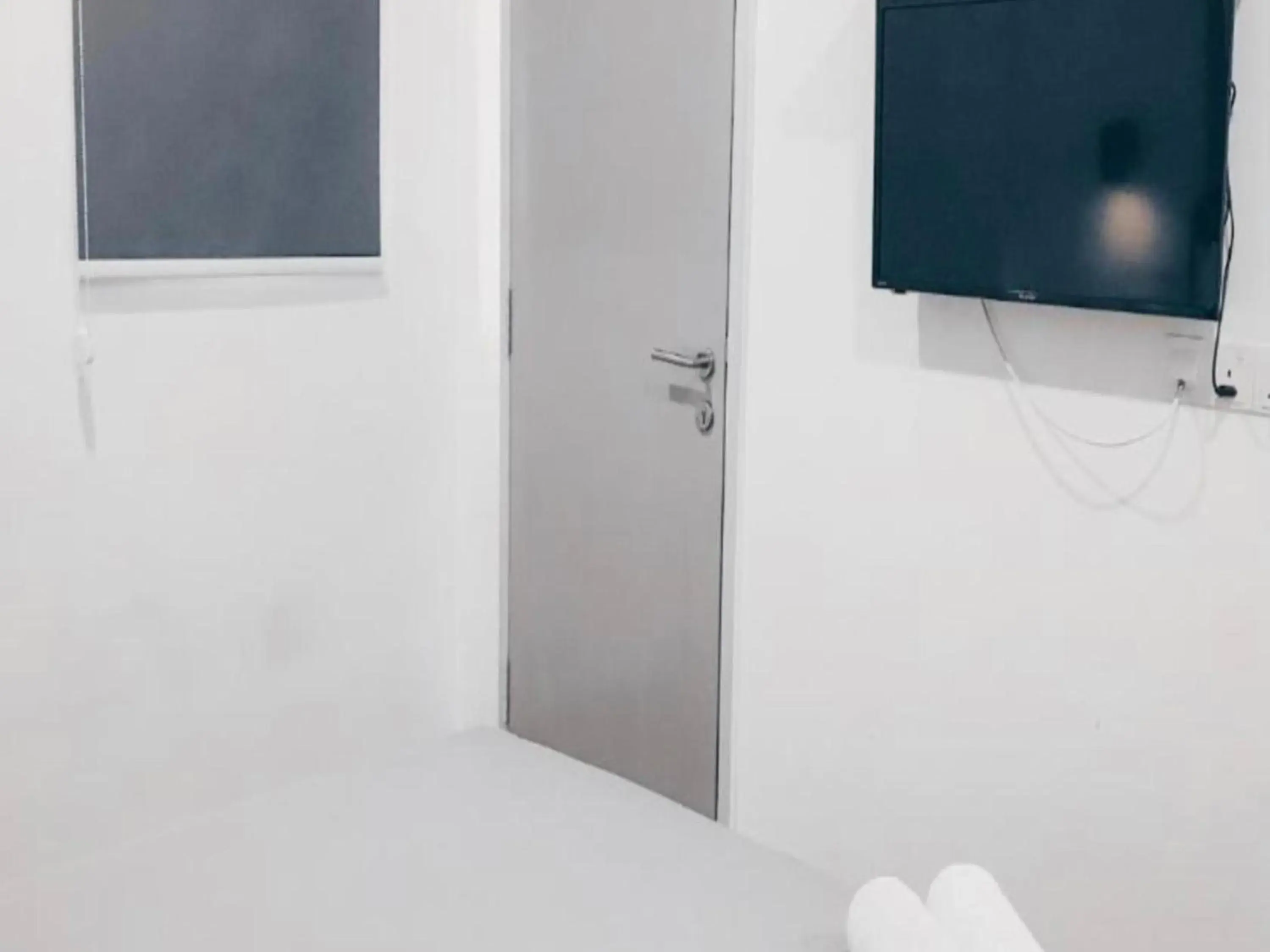 Bedroom in OYO 89492 Carlton Inn Bukit Ubi Bedroom in OYO 89492 Carlton Inn Bukit Ubi