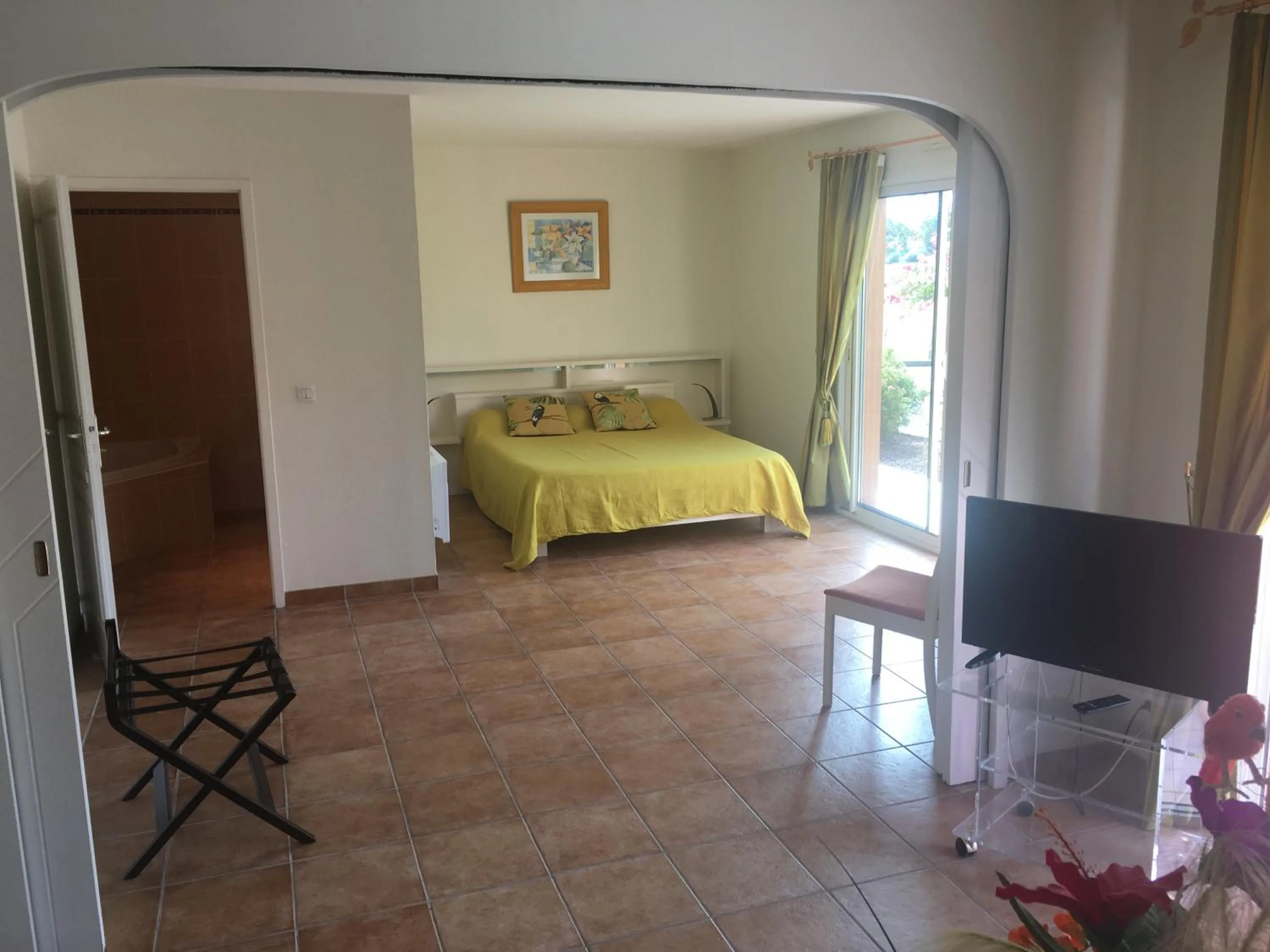 Bed in Chambres d'Hôtes La Coloniale