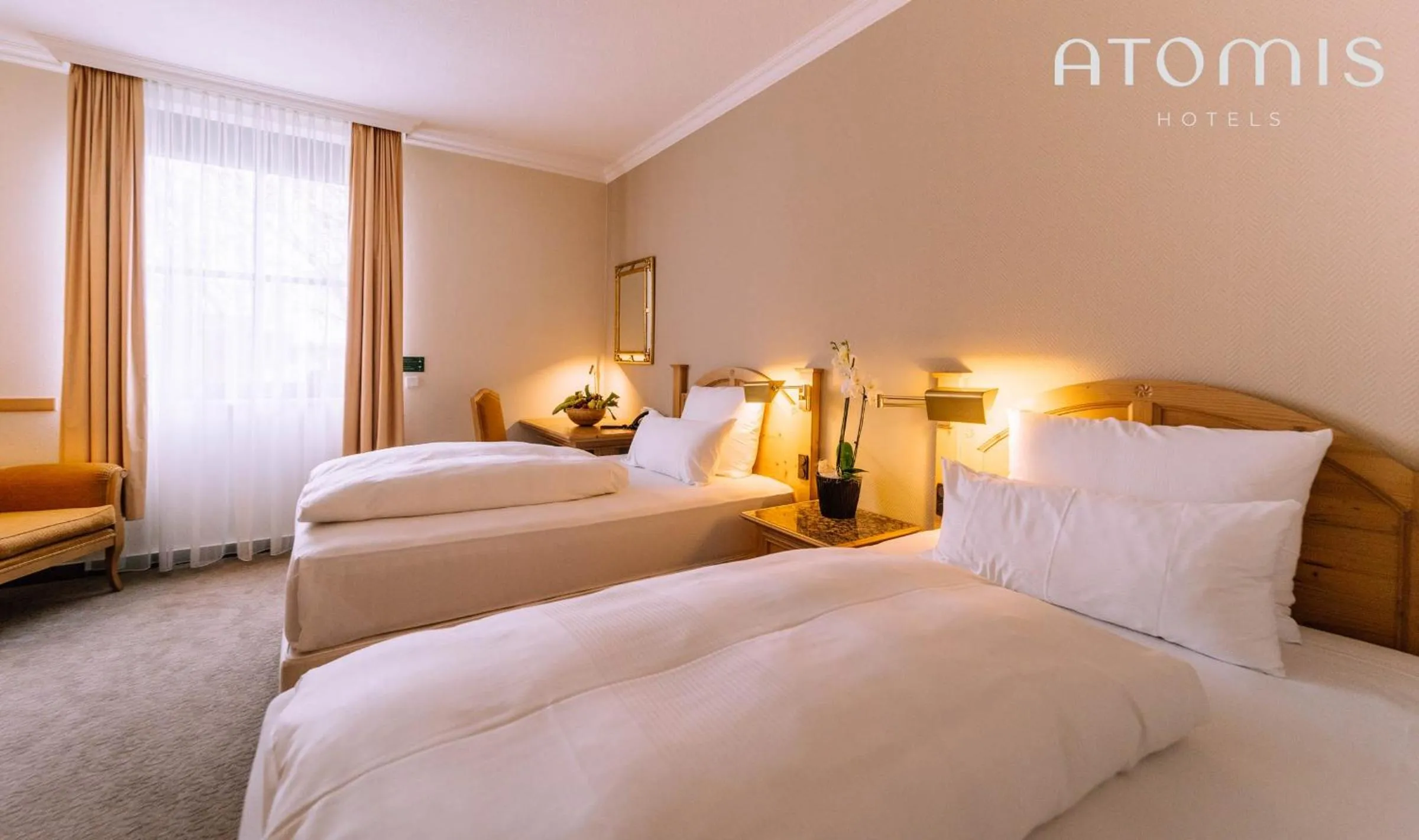 Photo of the whole room, Bed in Atomis Hotel Munich Airport by Mercure