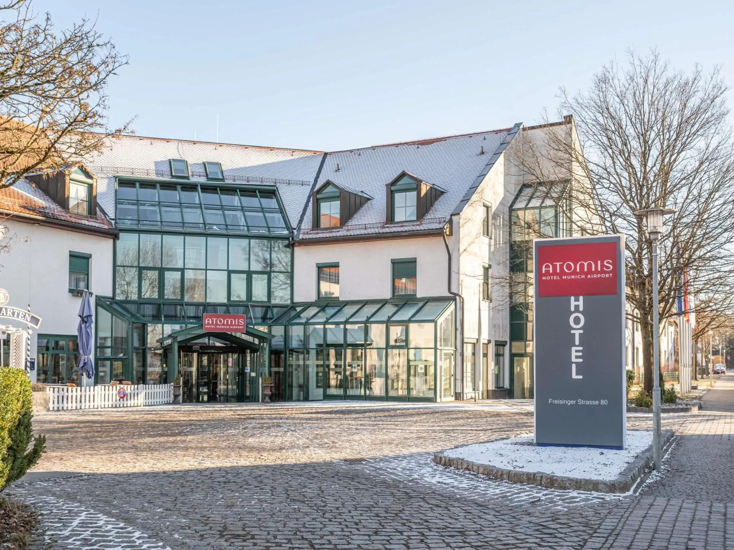 Property building in Atomis Hotel Munich Airport by Mercure Property building in Atomis Hotel Munich Airport by Mercure