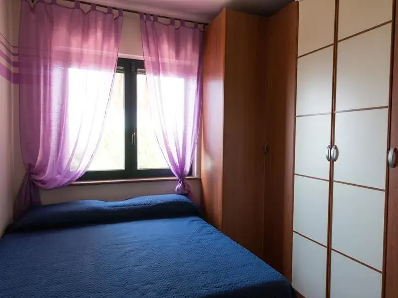 Quadruple Room in B&B Villa Meridiana Quadruple Room in B&B Villa Meridiana