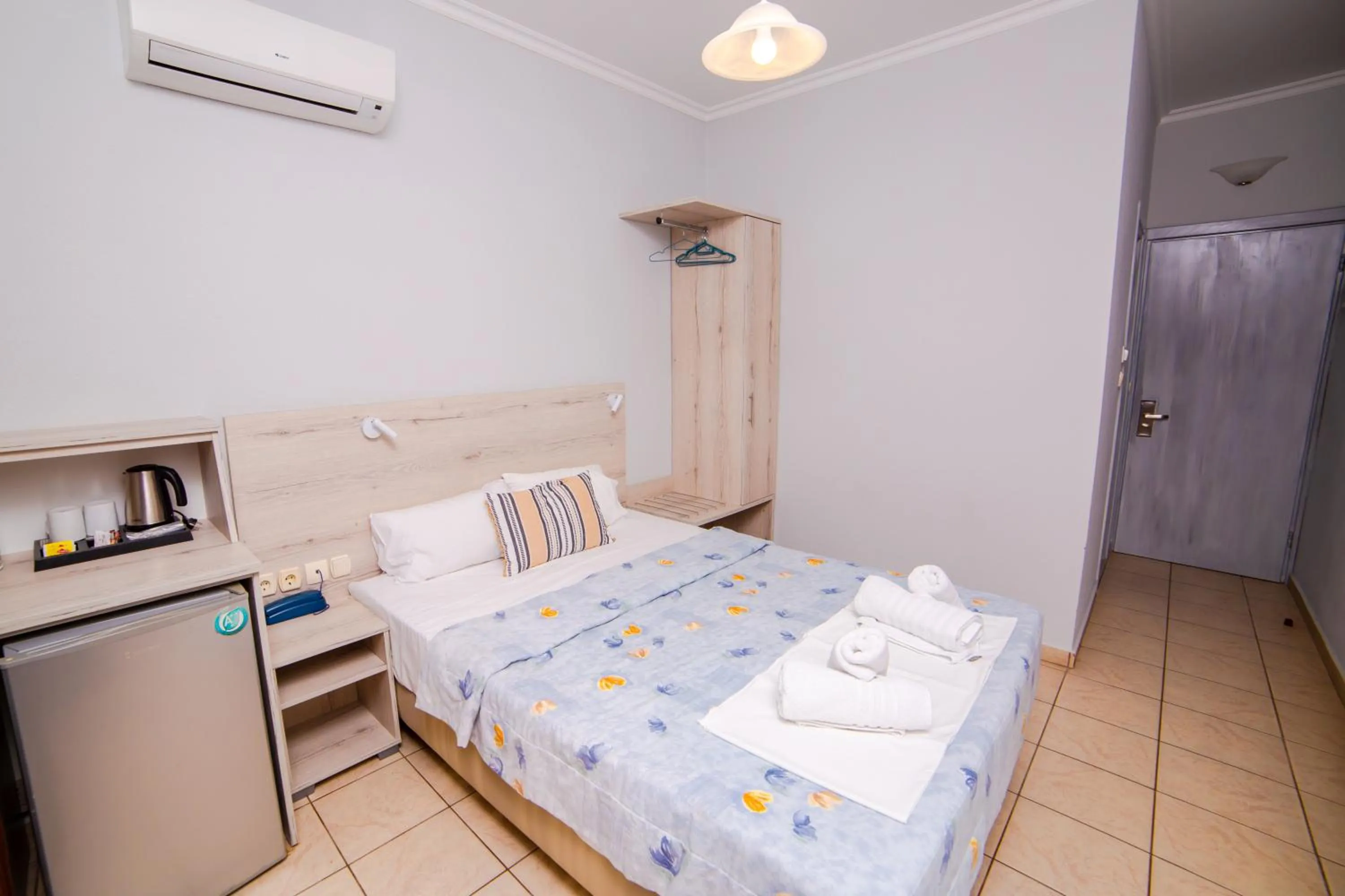 Bed in Hotel Zefyros