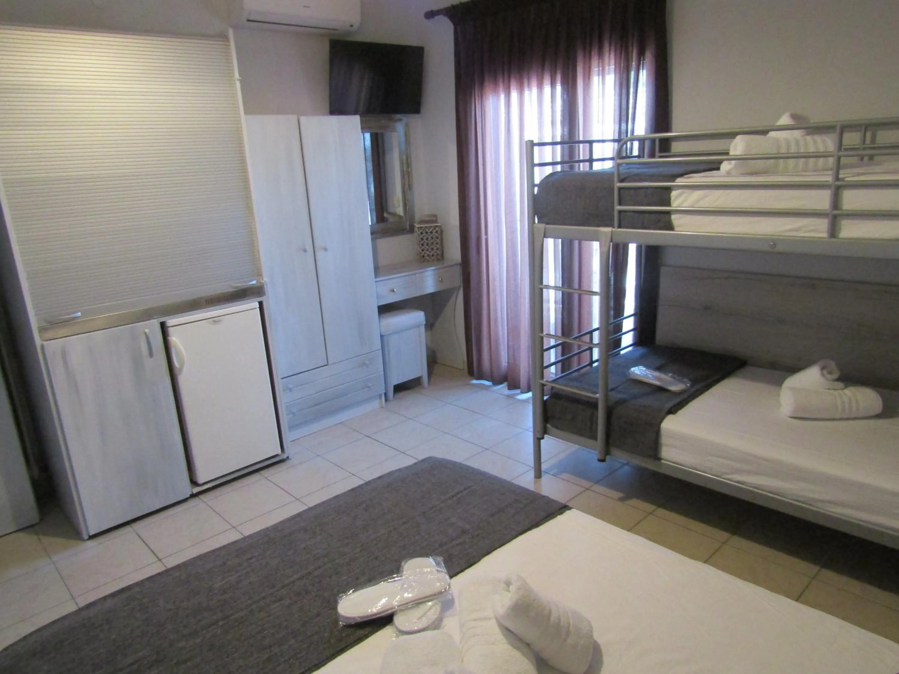 Bed in Hotel Zefyros