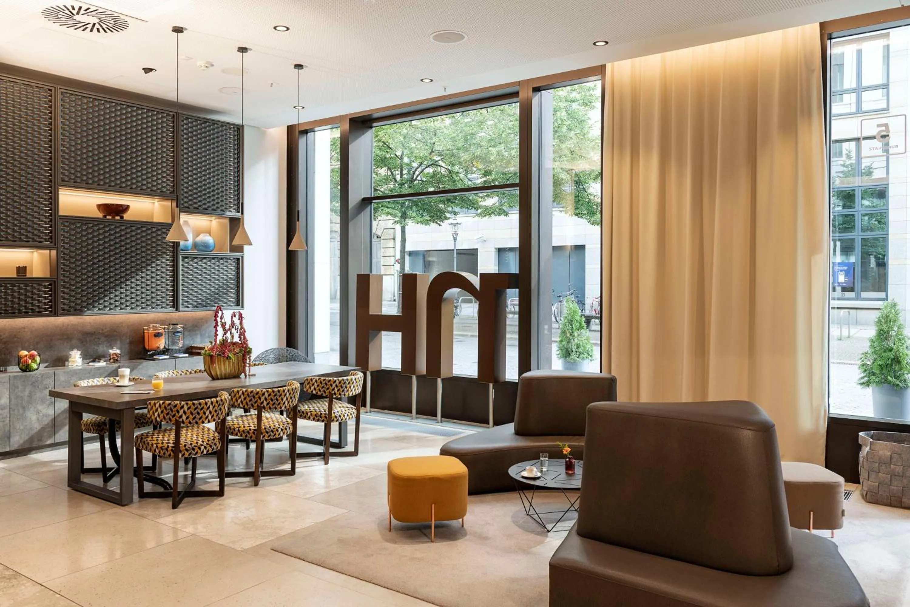 Lobby or reception in NH Leipzig Zentrum