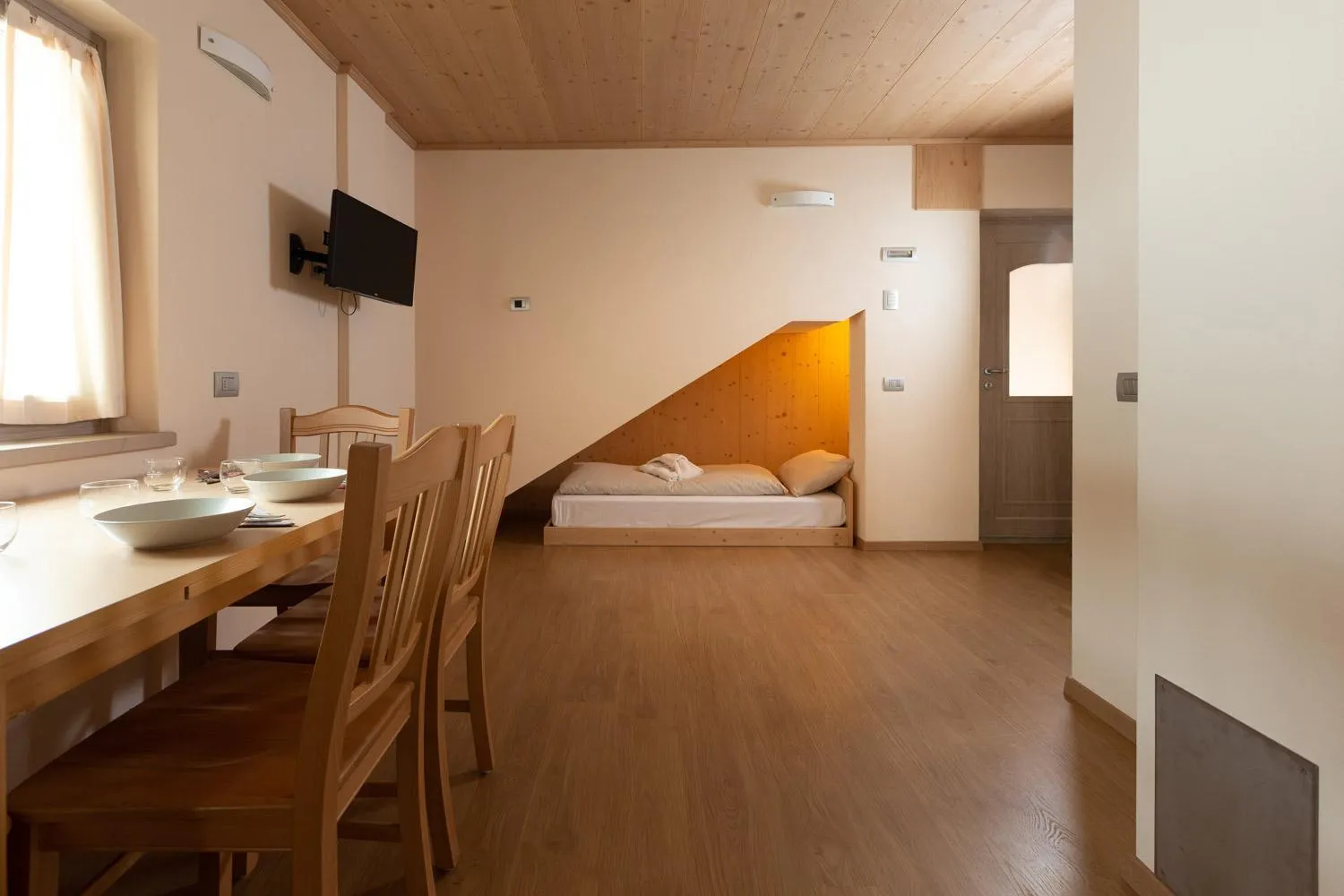 Living room, Bed in Hotel Meublè Adler - Rooms & Mountain Apartments