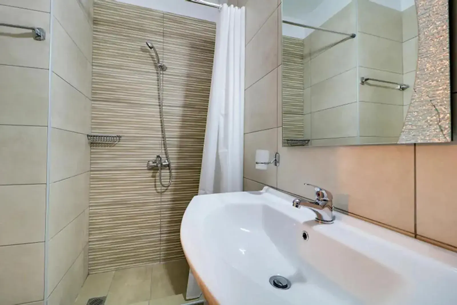 Bathroom in Calamos Beach Family Club Bathroom in Calamos Beach Family Club