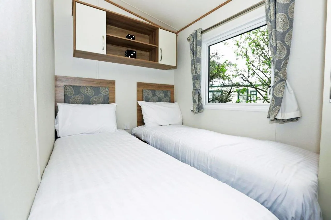 Bed in Newperran Holiday Resort