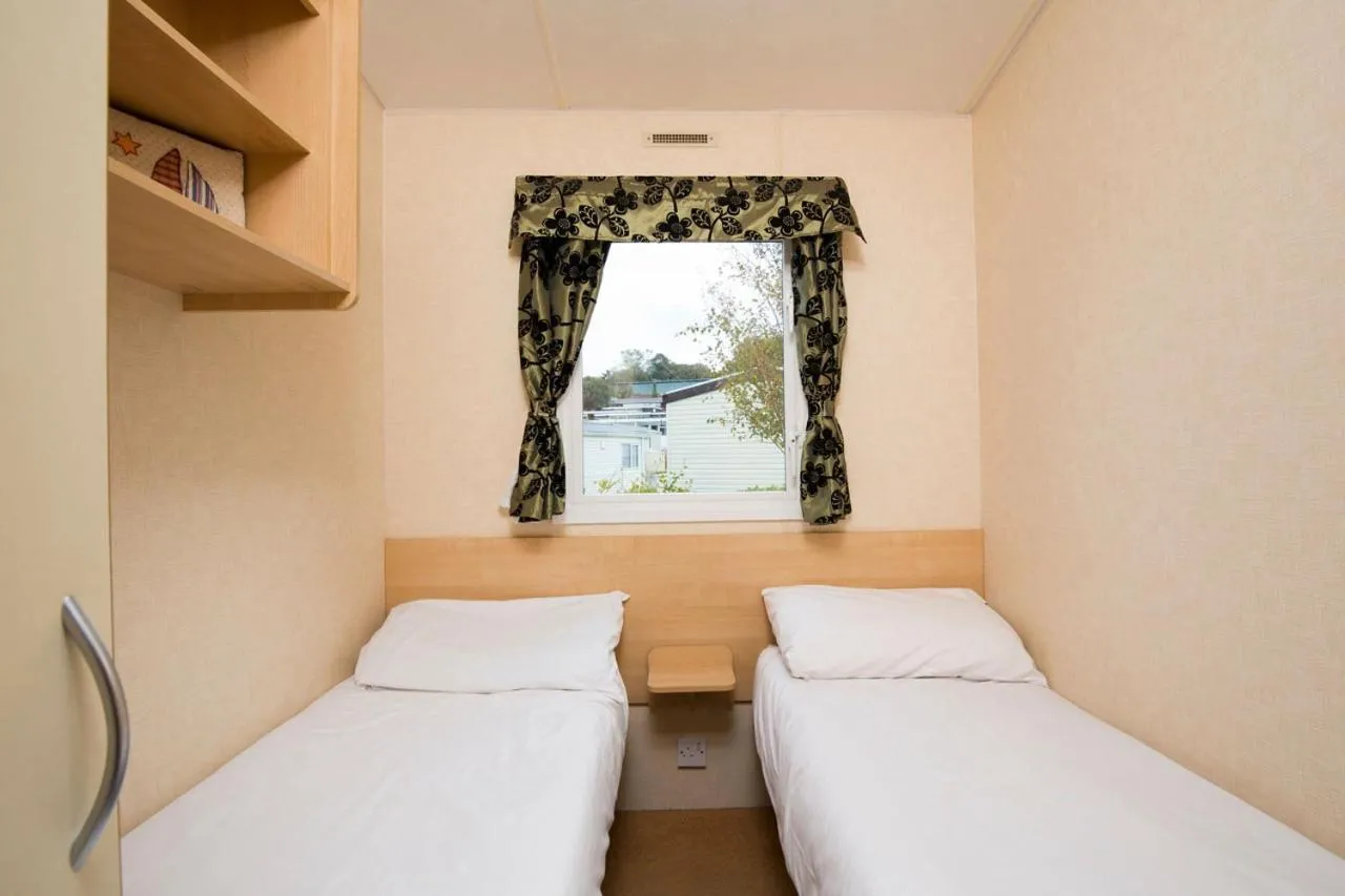 Bed in Newperran Holiday Resort