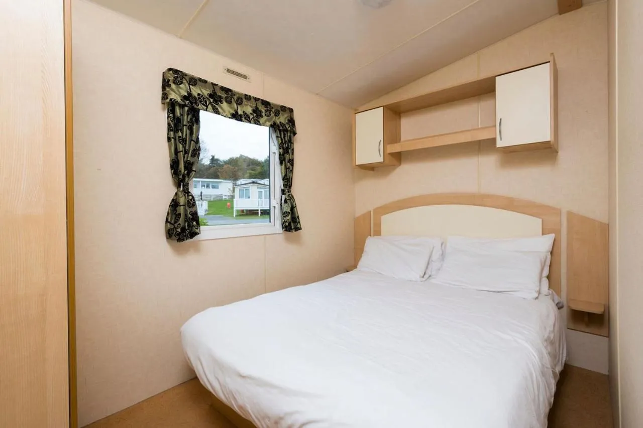 Bed in Newperran Holiday Resort